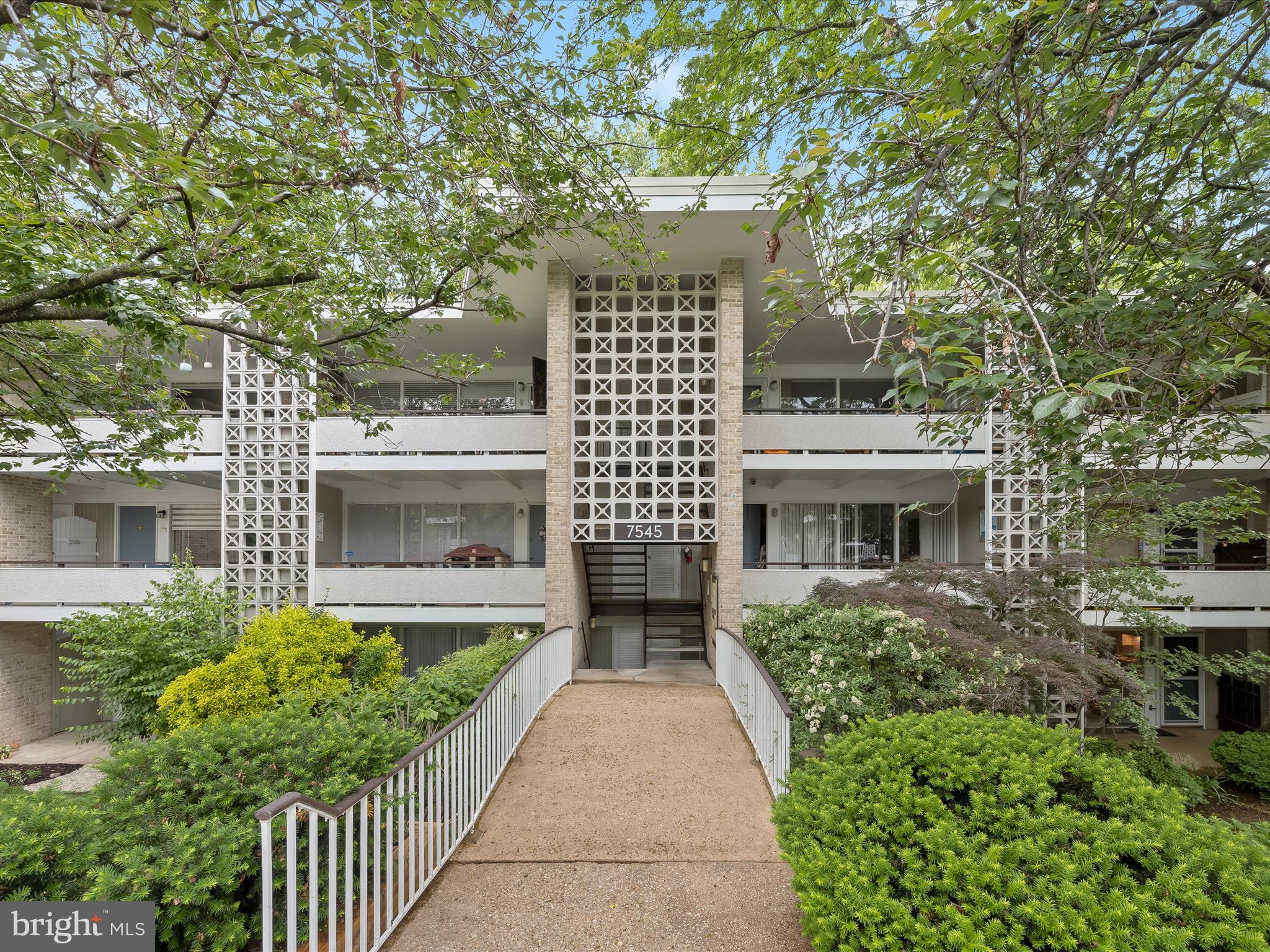 Welcome to this beautifully updated 2-bedroom, 1-bathroom condo nestled in the serene Spring Lake Condominium community in Bethesda, Maryland. Boasting tranquil green views from the rear deck, this home offers a perfect blend of modern upgrades and natural beauty.

Step inside to discover a fully renovated kitchen with stainless steel appliances, open to a spacious living room with brand-new luxury vinyl plank flooring and floor-to-ceiling windows looking out on the lush green views. The open-concept living and dining area is bathed in natural light, creating a warm and inviting atmosphere.

The spacious primary bedroom, featuring access to the private deck, has brand-new carpet and ample closet space. A renovated bathroom and secondary bedroom with large windows and a generous closet complete the space. Enjoy your morning coffee or evening relaxation on the private deck overlooking lush greenery, providing a peaceful retreat right at home.

Situated just minutes from Cabin John Shopping Center, Westfield Montgomery Mall, and Cabin John Regional Park, you'll have shopping, dining, and recreational options at your fingertips. Commuters will appreciate the easy access to I-495, I-270, and other major routes, as well as proximity to public transportation options. Don't miss your opportunity to own this charming condo that perfectly balances modern living with natural tranquility.