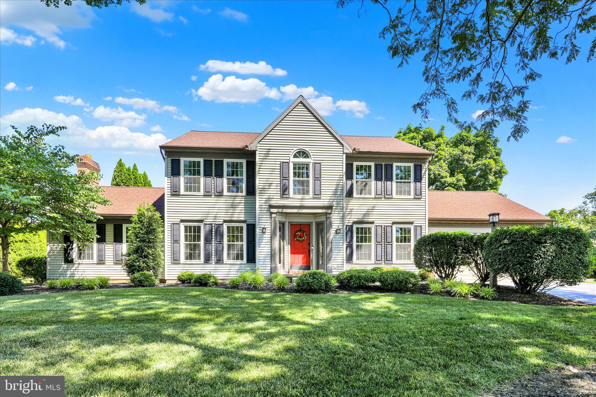 This beautiful colonial home in Milton Estates offers the full package with numerous features that you'll love.   With over 3700 total sq ft of finished space, there is plenty of room to grow in this home and entertain.  On the first floor just off the foyer, you will find a formal dining room and a den/office or playroom. The kitchen has been updated with tile backsplash, open shelving & newer dishwasher and refrigerator.  It is fully open to a beautiful sunroom with skylights which allow so much natural light and offers access to the large deck.  The spacious family room is also right off the kitchen and features a  lovely brick fireplace with gas insert.  Flooring in several first floor rooms has been upgraded to hardwood. This open floor plan and space is perfect for entertaining.  First floor laundry is right off the 2 car garage and comes with the washer and dryer. Head upstairs and you'll find the primary bedroom with a private bathroom and walk-in closet and then down the hall are 3 additional bedrooms and another full bath.   All flooring upstairs has been upgraded with new luxury vinyl tile in bathrooms and newer carpet in bedrooms. Basement is partially finished & recently remodeled with another half bath and bar area,  flooring upgraded to luxury vinyl tile- a great space for watching your favorite game or event!  Love to host outdoor gatherings? This nearly half acre yard and exterior space is perfect for it with the flat, open yard and plenty of space to play, set up a fire pit or just relax.  Located in the heart of Manheim Twp, you're close to schools, parks and shopping. Check out this beautiful home and neighborhood and fall in love with it all!