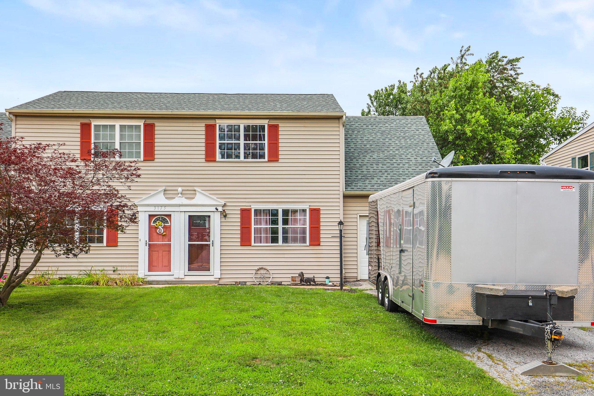 This 3-bedroom, 1.5-bathroom house offers approximately 1,378 square feet of living space. The primary bedroom features ample natural lighting and spacious closet storage. The two additional bedrooms are well-proportioned and could accommodate a variety of furniture arrangements. The 1.5 bathrooms include a primary bathroom with a vanity and a half bathroom located off the main living area. The layout seamlessly connects the living room, dining area, and kitchen, creating a comfortable and functional flow throughout the home. The kitchen is equipped with cabinetry providing generous storage. The fenced backyard offers a private outdoor space with room for various activities. This home is situated in a convenient location with access to Rt. 83 and Rt. 30 along with local amenities.
