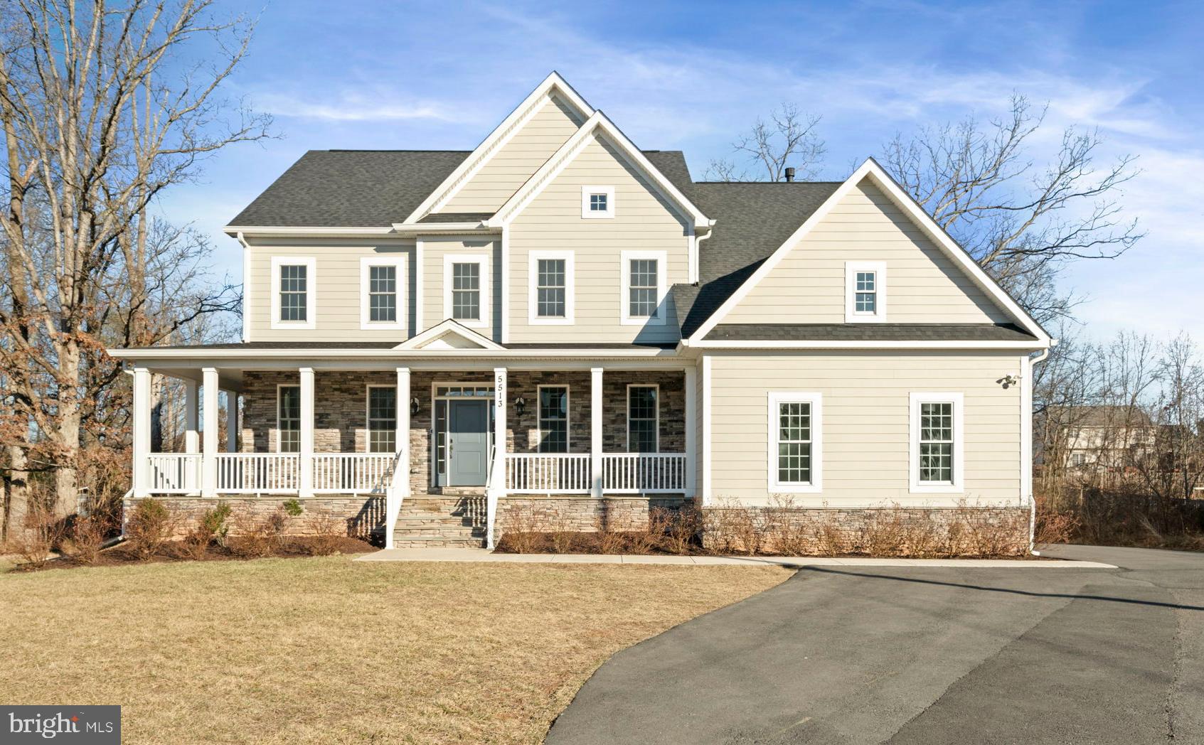 Nearly new! This custom built 7 bedroom, 6 bathroom craftsman style home is waiting for you.  Prime time location on Clifton Rd, near 29, I-66, and minutes away from shopping, restaurants, Dulles airport, and Metro stations.  Built in 2022, this home sits on a large .72 acre lot with private rear yard, and is offered for sale for the first time by the original owners!  You will be wowed from the moment you pull up to this magnificent home! The gorgeous exterior has an excellent front elevation with tasteful Hardi plank siding and trim, a large wrap around front porch, stone apron and stone exterior accent wall which provides a feeling of warmth and elegance.  This gem comes equipped with a side load  3 car garage wired for an EV charger, a huge rear yard, an expansive composite deck with screened in porch and a widened driveway with additional parking pad around back. The moment you step inside the front door you will be wowed by the open concept living space with 9ft ceilings, extensive lighting and wood trim package with coffered ceiling in the living room, crown moldings, chair rail, and shadowbox moldings throughout. There are gleaming hardwood floors throughout the entire main level and they extend up the staircase and into the upper bedroom level of the home! The large family room is magnificent with a coffered ceiling and cozy gas fireplace. The main level is an entertainer's dream with formal touches abound, tray ceiling in the formal dining room, a formal living room space, sunroom with vaulted ceiling and a full bathroom and bedroom on the main level.  The open concept gourmet kitchen looks out into the large family room and is connected to the sunroom which can host a crowd. There is ample space for a large table for congregation and meals. The sunroom with a massive wall of floor to ceiling windows exits to a large composite deck and fantastic screened in porch. The heart of the home, the massive kitchen, has space for a crowd and loads of storage! Featuring 42-inch white shaker wood cabinetry with crown molding trim, an elegant island with seating space and neutral granite counter tops.  The stainless appliances include a Z-Line Legacy range with 6 burner gas cooktop and an electric convection oven, one wall oven with built in microwave above, dishwasher, and a generous sized fridge/freezer is truly a chef's dream! The kitchen has an enormous walk in pantry and around to the rear of the kitchen you'll find a mud room area with large storage/cleaning closet.  The upper bedroom level has 4 large bedrooms and a laundry room.  The owner's suite, is just that, a suite! The owner's bedroom has a sitting area/den with a gas fireplace.  The fireplace is the focal point of this space and is wired for a wall mounted TV above the mantle and is flanked by has built in open shelving on either side.  The bedroom area has a tall tray ceiling, a fan/light above the bed area, as well as crown molding trim and recessed lighting. The walk in closet and owner's bath will wow you some more!  The bath has a double soaker jacuzzi tub, a tiled walk in shower, a toilet closet, linen closet, and two sink vanities, one with a make up desk.  All of the secondary bedrooms upstairs are generous in size and have walk in closets.  One bedroom has an ensuite full bathroom and the other two are adjoined with a shared Jack and Jill bath.  The lower level is a walk out and has tons of space including two bedrooms and two full bathrooms, a media room, a den or playroom and open recreation space.  There is a second laundry area in the basement bedroom with hookups for a washer/dryer.  The walk out doors exit to a concrete patio under the expansive upper deck with a view of the rear yard.  The lower level has new carpet and laminate wood plank flooring.  The rear yard has space for sports, games and entertaining.