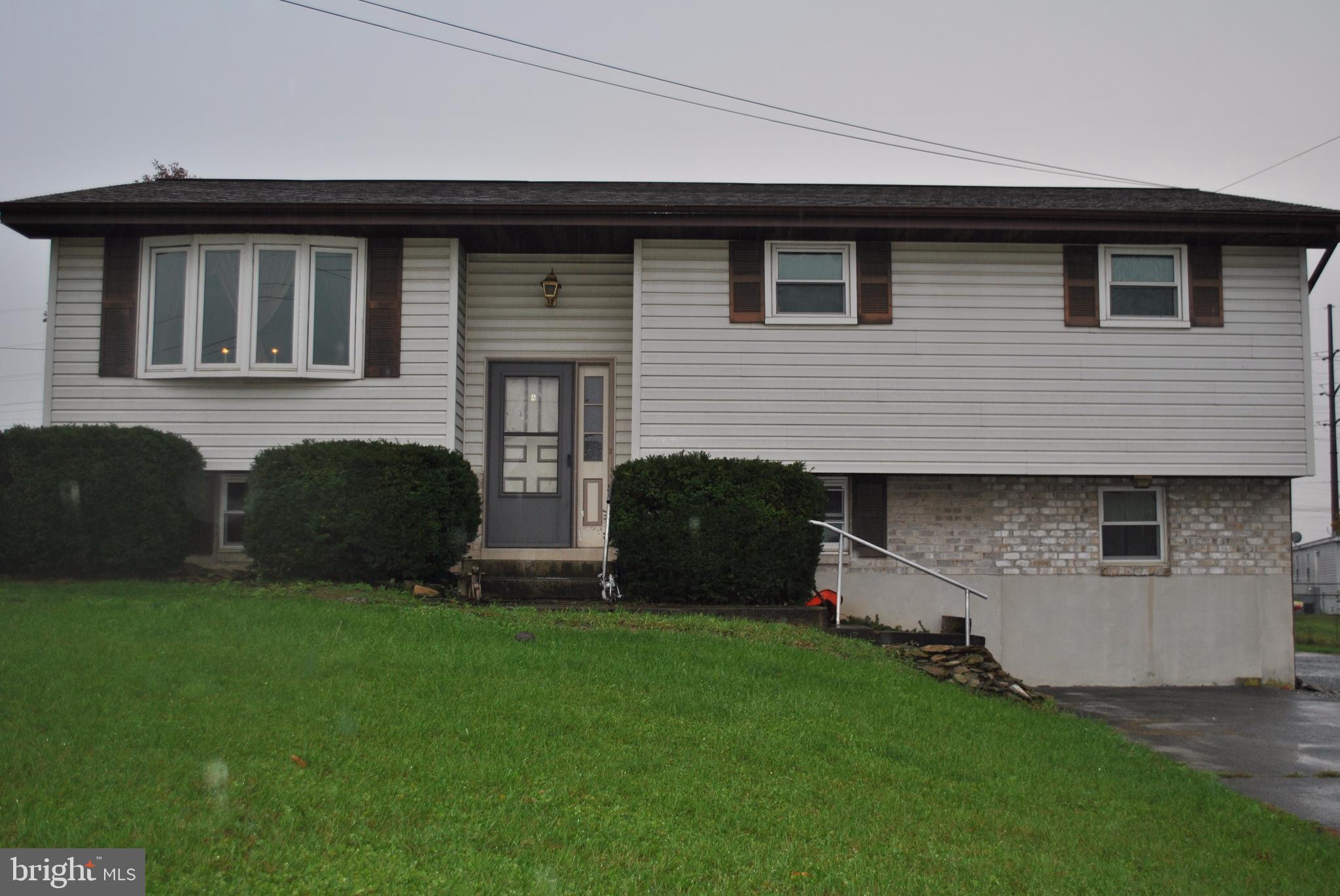 This conveniently located very nice bi-level home is currently tenant occupied but could easily be converted to a single family residence again.  The lower level would also be perfect as in-law quarters.   The backyard has a beautiful deck and bar.  Lots of possibilities with this home!