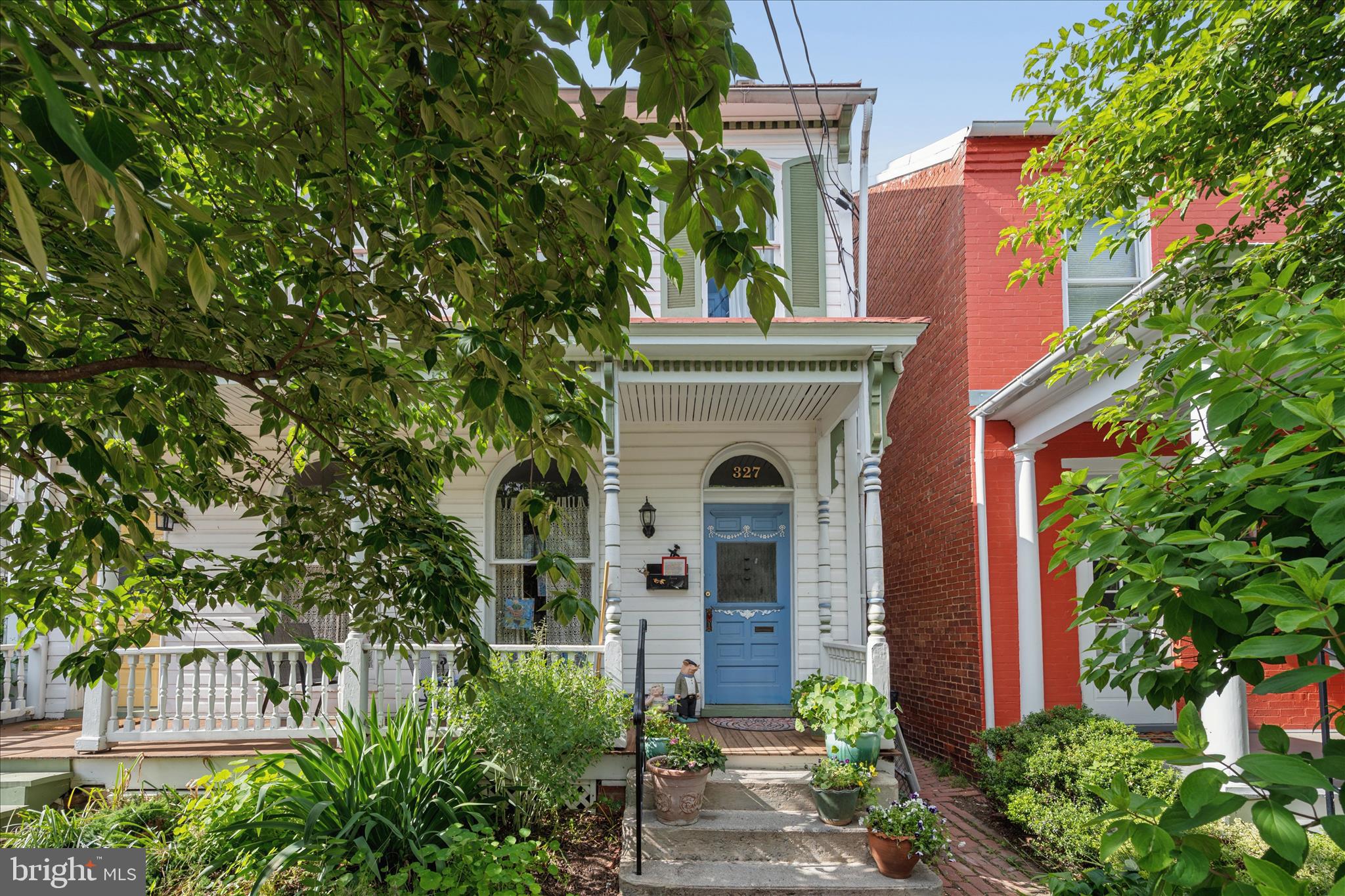 Priced to Sell! Located in the heart of Downtown Frederick on the quieter end of town, this charming 3-level home offers the perfect blend of historic character, walkability, and future potential. Enjoy your morning coffee and newspaper on the sunny front porch, then unwind in the beautifully private rear garden — a true secret garden filled with seasonal blooms, fenced for privacy, and leading to convenient alley parking. The cozy breakfast room offers peaceful garden views year-round, even on rainy days.
Just a short stroll to vibrant downtown shops, restaurants, Carroll Creek, bakeries, art galleries, breweries, and Frederick’s beloved arts and crafts scene, this location offers an exceptional, walkable lifestyle. Enjoy easy access to local favorites, community events, festivals, and scenic creekside paths right outside your door.
Inside, the home retains much of its original charm while offering important updates that count, including a newer roof with added insulation. The appliances are young, and the washer and dryer are newer. The upper floors offer abundant natural light throughout.
With excellent bones and timeless character, this well-loved home is patiently awaiting your cosmetic touches and final improvements to truly make it shine. 
A rare opportunity to own a charming downtown Frederick home with incredible walkability, character, private outdoor space, and endless potential. This one is worth a second look!
