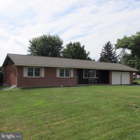 Nice 3 bedroom, 1 bath, brick ranch home with an attached 2 car garage!  1st floor laundry, lower level family room with loads of space.  Nice deck overlooks backyard and farmland.  Washer, dryer, fridge to convey and ready for quick settlement and occupancy!  Newer roof and replacement windows. Call today!