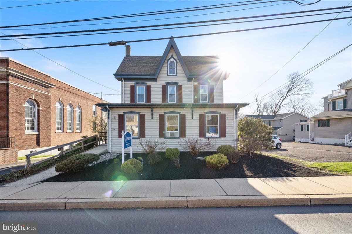 Welcome to 46 North Main Street, ideally located in the heart of Chalfont Borough. This beautifully maintained and thoughtfully updated mixed-use property presents a rare opportunity for both investors and owner-occupants. The residential component features a spacious two-story apartment with a newer roof and windows. Enter into a full kitchen with a deep pantry, an open-concept living area, a generously sized bedroom with a large closet that includes a washer and dryer, and a full bathroom. The second level offers three additional rooms, providing flexibility for added living space or home office use. The main level is currently configured for commercial use and is tenant-occupied, offering immediate income and versatility for a variety of professional, retail, or service-based uses. Backing directly to the scenic Krupp Memorial parkland with walking trails and a peaceful stream, this property offers a unique blend of visibility and natural surroundings. Enjoy the convenience of being just a short walk to the Chalfont train station, making commuting effortless while still having access to outdoor space right in your backyard. Whether you're an investor seeking a stable, income-producing asset or an entrepreneur looking to own your workspace while generating additional revenue, this property offers exceptional versatility and long-term value. Located within the highly regarded Central Bucks School District and just moments from local shops, dining, and major roadways, 46 N Main Street is a smart and strategic addition to any real estate portfolio.