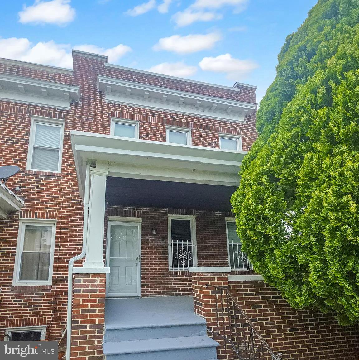 Excellent investment and/or owner occupant opportunity; the numbers work! This recently refurbished 2-unit, end-level townhome has a spacious, renovated 3 bedroom with den that is turnkey and move in ready.  Home features updated kitchen with all new stainless appliances, new flooring, updated full and half bath, skylight, formal living and dining room area, rear deck area, cozy front porch, new washer-dryer, neutral decor, plenty of storage space and more.  The basement unit is a staple neighborhood grocery store, currently on month to month lease ($1500/month), but tenant willing to extend.  Upstairs unit could generate over $2,000/month rental income; great for rental income or primary residence.  One block from trails at Gwynn Falls Park.  Showings by appointment.