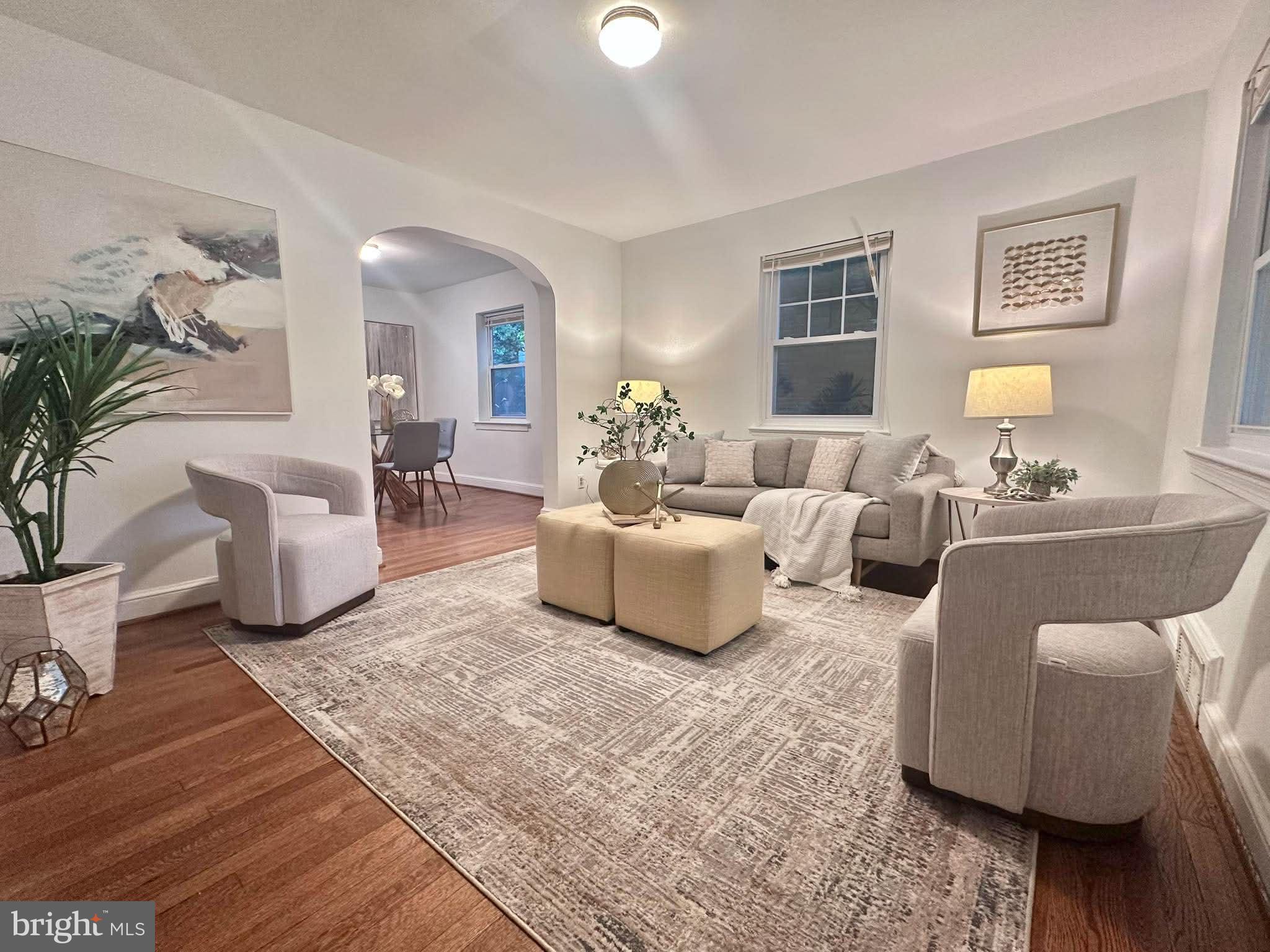 Only a Few Built. Opportunities like this rarely come available in sought-after Lyon Park. This all-brick side-by-side home offers the charm and character buyers love, combined with a location that makes everyday living easy. Enjoy sidewalk access to Clarendon Metro, restaurants, shopping, parks, and some of Arlington's most popular destinations.

The versatile floor plan features 3 bedrooms and 2 full baths, including a walk-out lower-level bedroom and bath that works well as a guest suite, home office, or private living space. Recent improvements include a new roof (less than one year old), renovated upper level, updated kitchen finishes, vinyl windows, and a spacious deck perfect for entertaining.

A large attic with LVL flooring and windows provides valuable storage and flexible space for a gym, office, or hobby area. The backyard is ideal for gardening, pets, or weekend cookouts. Completing the package are three dedicated rear alley parking spaces, a rare find this close to Clarendon. Whether you're looking for a primary residence or an investment property, this is a unique opportunity in one of Arlington's most desirable neighborhoods.