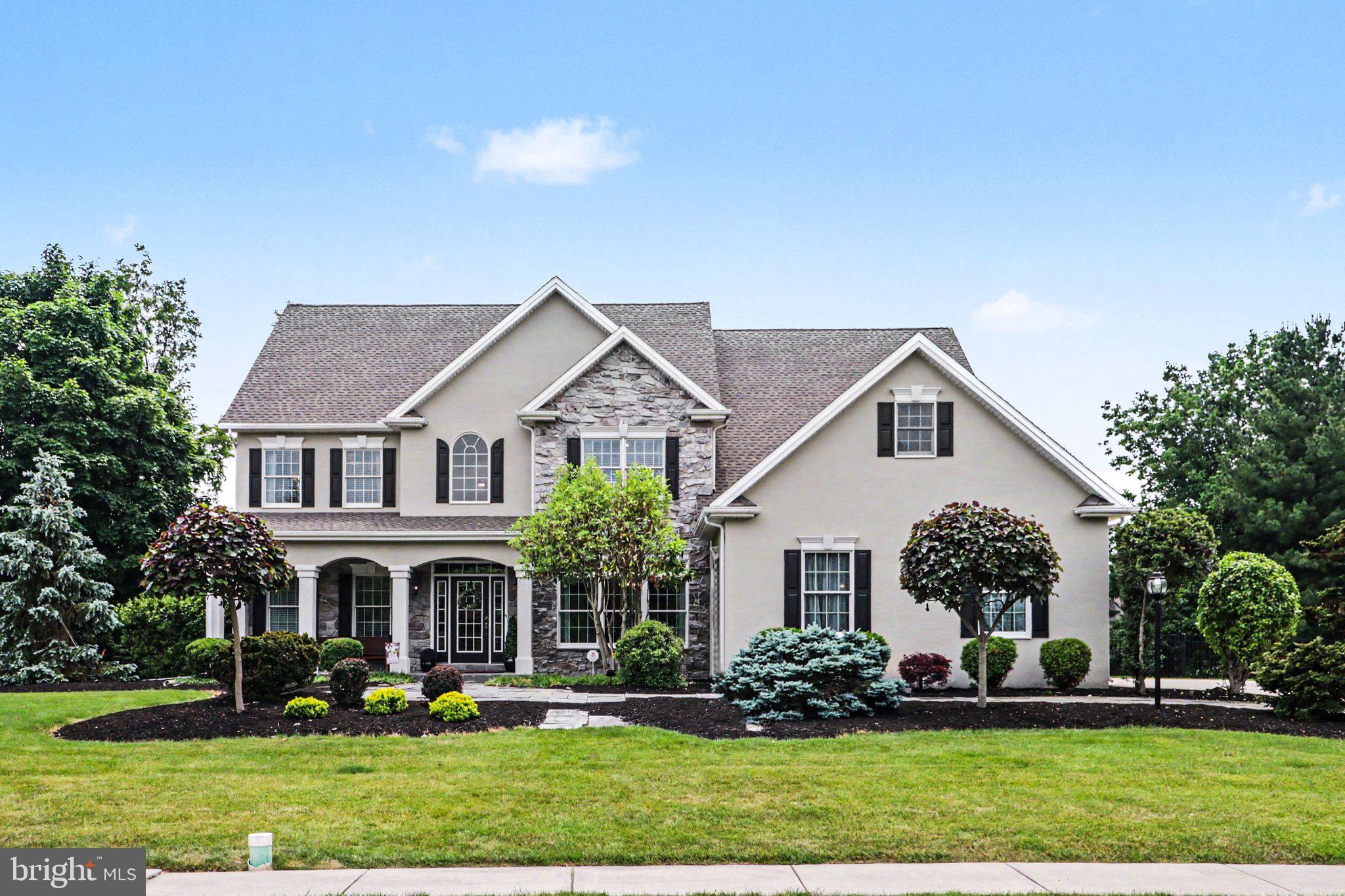 Welcome to 2312 Forest Lane, a beautifully appointed luxury home built by Roland Builders offering 4,356 square feet of thoughtfully designed living space, including a finished lower level, all nestled on a picturesque .63-acre lot in a desirable sidewalk community close to shopping and dining. From the moment you enter, the home blends timeless elegance with everyday comfort. The formal living room, highlighted by a cozy gas fireplace and hardwood flooring, flows seamlessly into the formal dining room, creating the perfect setting for entertaining and special gatherings.
At the heart of the home is the spacious kitchen featuring a center island, granite countertops, tile backsplash, pantry, and sunny dining area, ideal for both casual mornings and hosting family and friends. Two private office spaces provide exceptional flexibility, with one currently serving as a playroom and the other enhanced by hardwood flooring and crown molding, perfect for working from home or quiet study.
Upstairs, the luxurious primary suite offers crown molding, a walk-in closet, and a private full bath designed for relaxation. Four additional generously sized bedrooms are connected by convenient Jack-and-Jill baths, offering comfort and functionality for family and guests alike.
The finished lower level extends the home’s entertaining possibilities with a welcoming family room featuring hardwood flooring and a wet bar, a spacious game room with tile flooring that could also serve as a 6th bedroom, and an additional half bath. Additional highlights include main-level laundry, a side-entry 3-car garage, and an inviting setting in a sought-after neighborhood. A home that combines elegance, space, and warmth. Truly a joy to own.