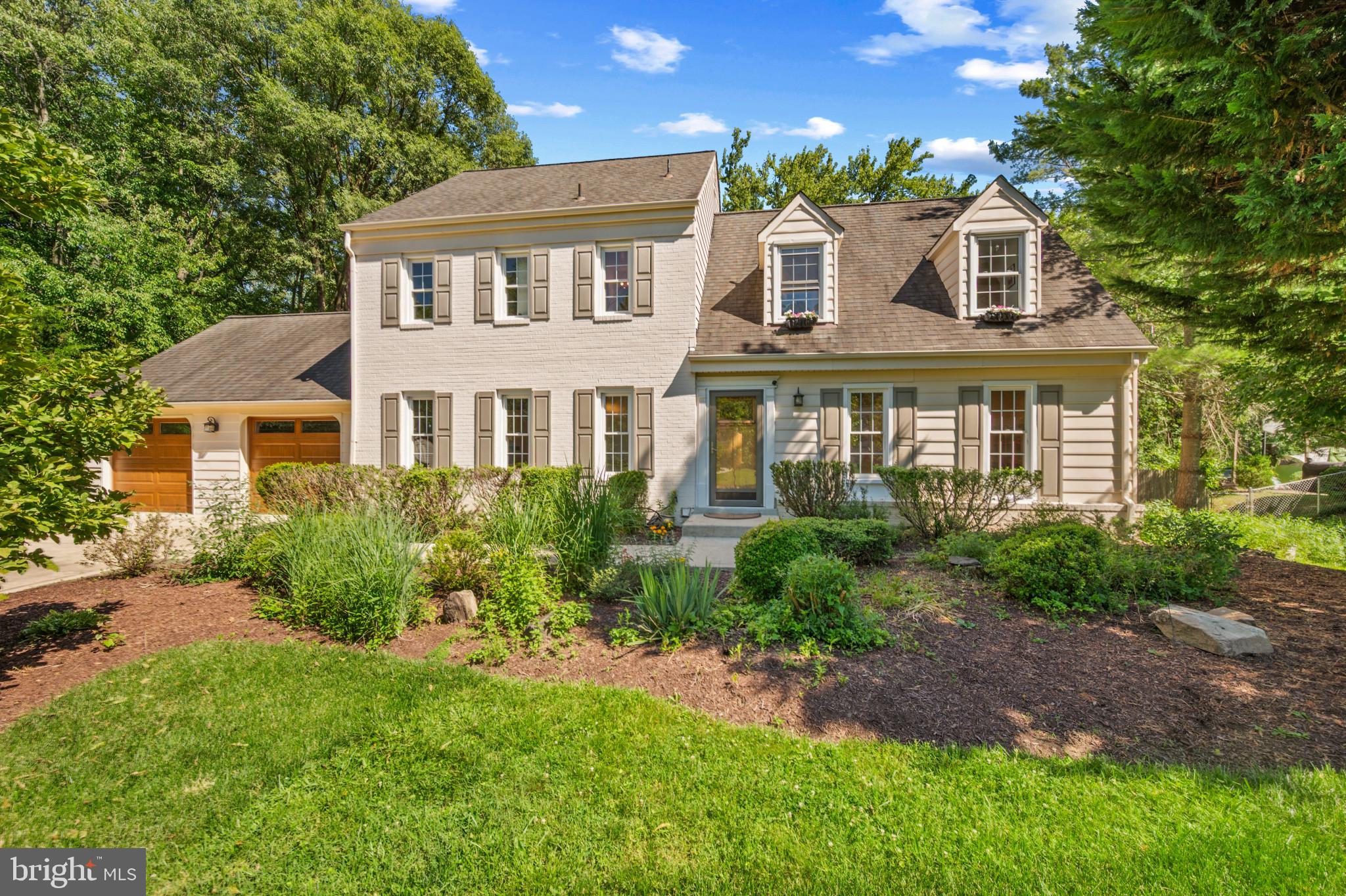 Welcome to 13848 Turnmore Road, a stunning, sun-drenched detached residence offering over 3,400 square feet of thoughtfully designed living space in the heart of Silver Spring. Situated on an expansive lot framed by mature trees and seasoned perennial gardens, this home perfectly blends suburban tranquility with modern elegance.

Step inside to find a warm, inviting interior characterized by gleaming hardwood floors and an effortless flow. The main level features a formal living room, a gracious dining room, and an expansive family room anchored by a cozy fireplace. At the heart of the home is the chef’s kitchen, beautifully outfitted with premium quartz countertops, sleek appliances, and a bright eat-in area with a large picture window overlooking the lush grounds. From the main living areas, step out onto your private deck—a seamless setup for indoor-outdoor entertaining.

Upstairs, the home boasts 5 generously sized bedrooms and 2 well-appointed bathrooms. The primary suite serves as a true sanctuary, complete with a large walk-in closet and a luxurious ensuite bathroom featuring a separate shower. Crowning the upper level is a versatile finished attic, while the massive, full basement—complete with high ceilings and proper egress—presents an incredible blank canvas for a home theater, gym, or guest suite.

The outdoor oasis features a fully fenced backyard and a serene garden plot, offering a peaceful escape. An attached, oversized garage provides convenient parking alongside extra room for a workshop or storage. Meticulously maintained with dual-zone central air and forced-air heating for year-round comfort, this exceptional property is ready for its next chapter. Schedule your tour today!