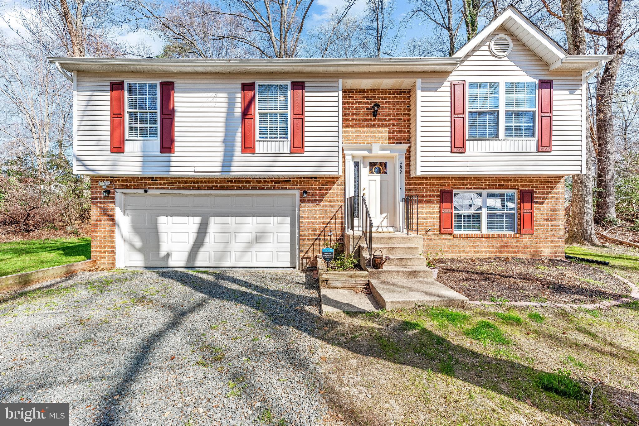 IMMACULATE!!! This UPDATED 2000sqft 3 Bedroom 2.5 Bathroom home was fully renovated in 2020! The curb appeal is the first thing you notice! A nice grassy area, large driveway, & a 2-car attached garage are great bonuses! Upon entry you instantly notice how clean and well-kept this home is! Upstairs a good-sized family room seamlessly flows into the rest of the home via the modern LVP flooring. Just off of the family room is the dining area which leads to the back deck and an upgraded kitchen. The kitchen boasts white shaker style cabinetry, granite countertops, stainless appliances, and a tile backsplash! Just down the hall are 3 bedrooms and 2 full bathrooms. Both the hall bathroom and the primary bathroom are updated with newer vanities, tile flooring, brushed nickel fixtures and tile showers. Downstairs is an open concept with a large rec room, a half bathroom, & access to the home's oversized 2 car garage. The rec room is equipped with a projector and a large screen that both convey! The front section of the rec room could be easily converted into a 4th bedroom. Architectural roof is only 2 years old! This home is ready for its new owners!!