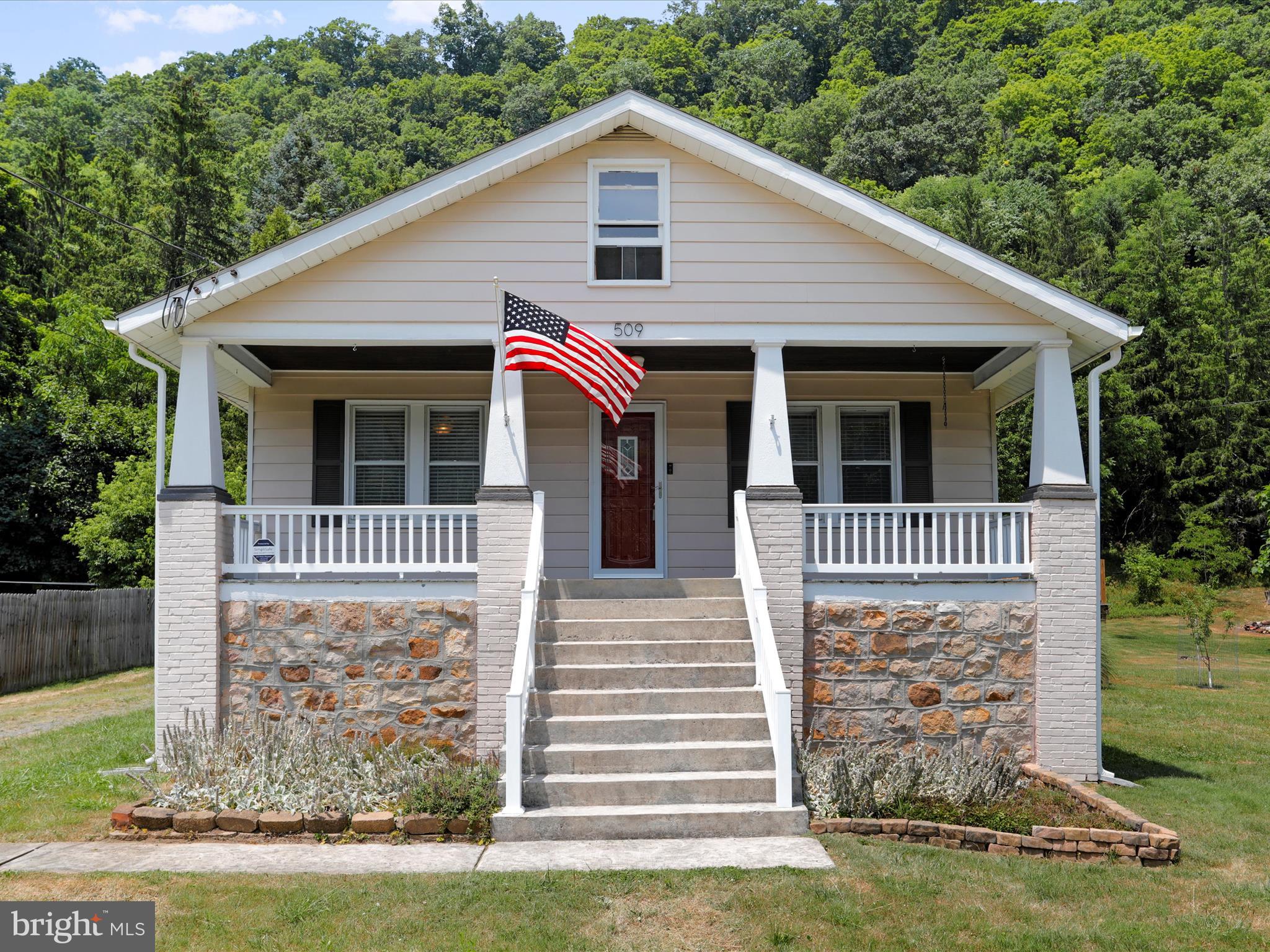 New Price! This charming 1940's home combines vintage appeal with unique historical features on 1 acre. It includes 2 bedrooms and 2 bathrooms, an updated large kitchen area providing comfortable living spaces.  The unfinished basement offers potential for customization and expansion.  Additionally, the property features a rare bomb shelter in the backyard, a fascinating relic from the past.  This home is perfect for those who appreciate character, history and the opportunity to create their own personalized space.  This property is a must see.