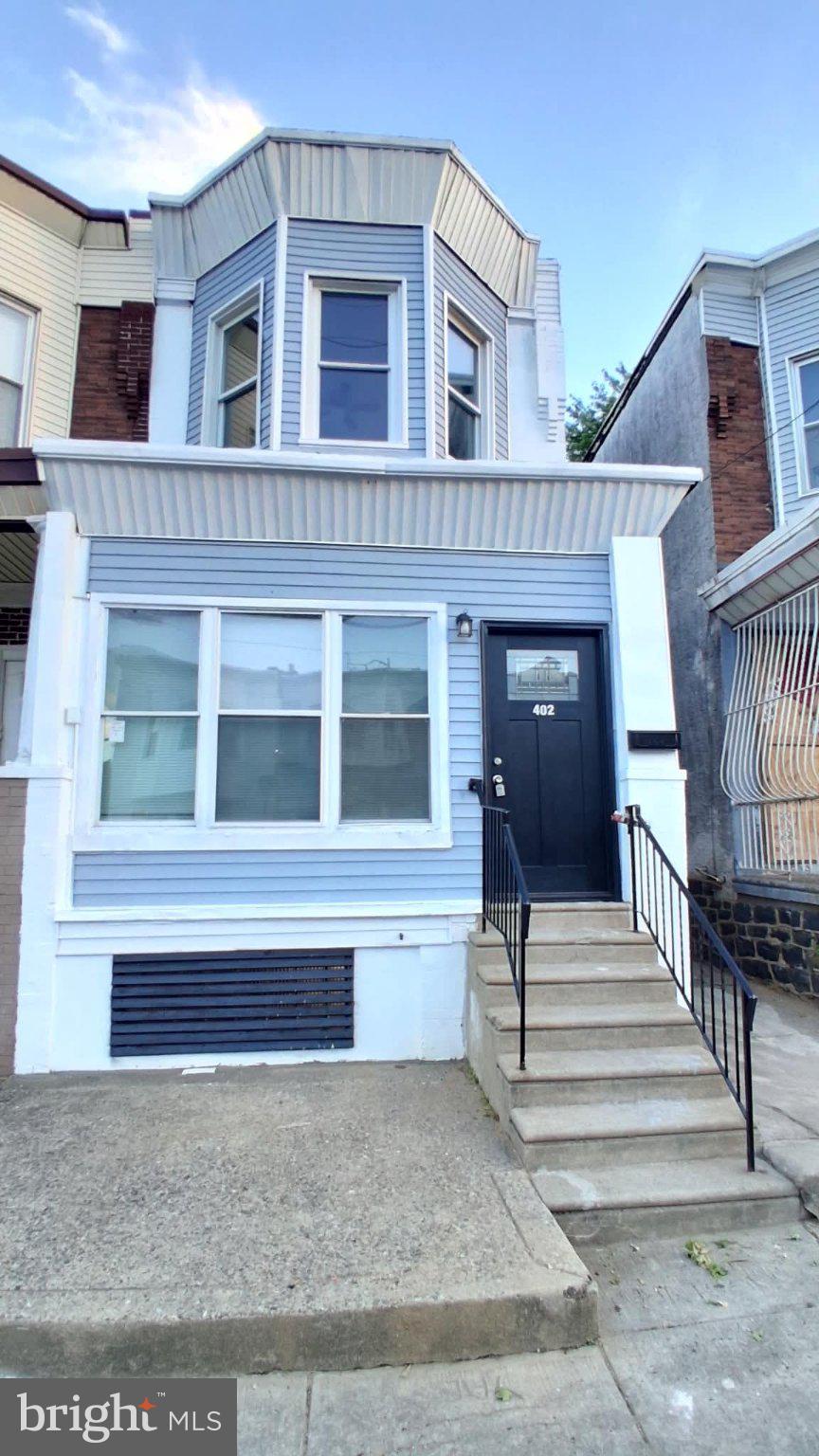 402 W Ruscomb is a renovated 3-bedroom, 3-full-bath rowhome with a fresh modern look throughout. The property features an updated exterior, open main living space, gray luxury vinyl plank flooring, recessed lighting, and a bright kitchen with blue cabinetry, white countertops, tile backsplash, and modern fixtures.
Each bathroom has been updated with clean finishes, newer vanities, and tub/shower surrounds. Upstairs offers carpeted bedrooms with good natural light, ceiling fans, and fresh trim. Overall, it presents as a move-in-ready, rental-ready home with modern updates and a clean, polished interior.