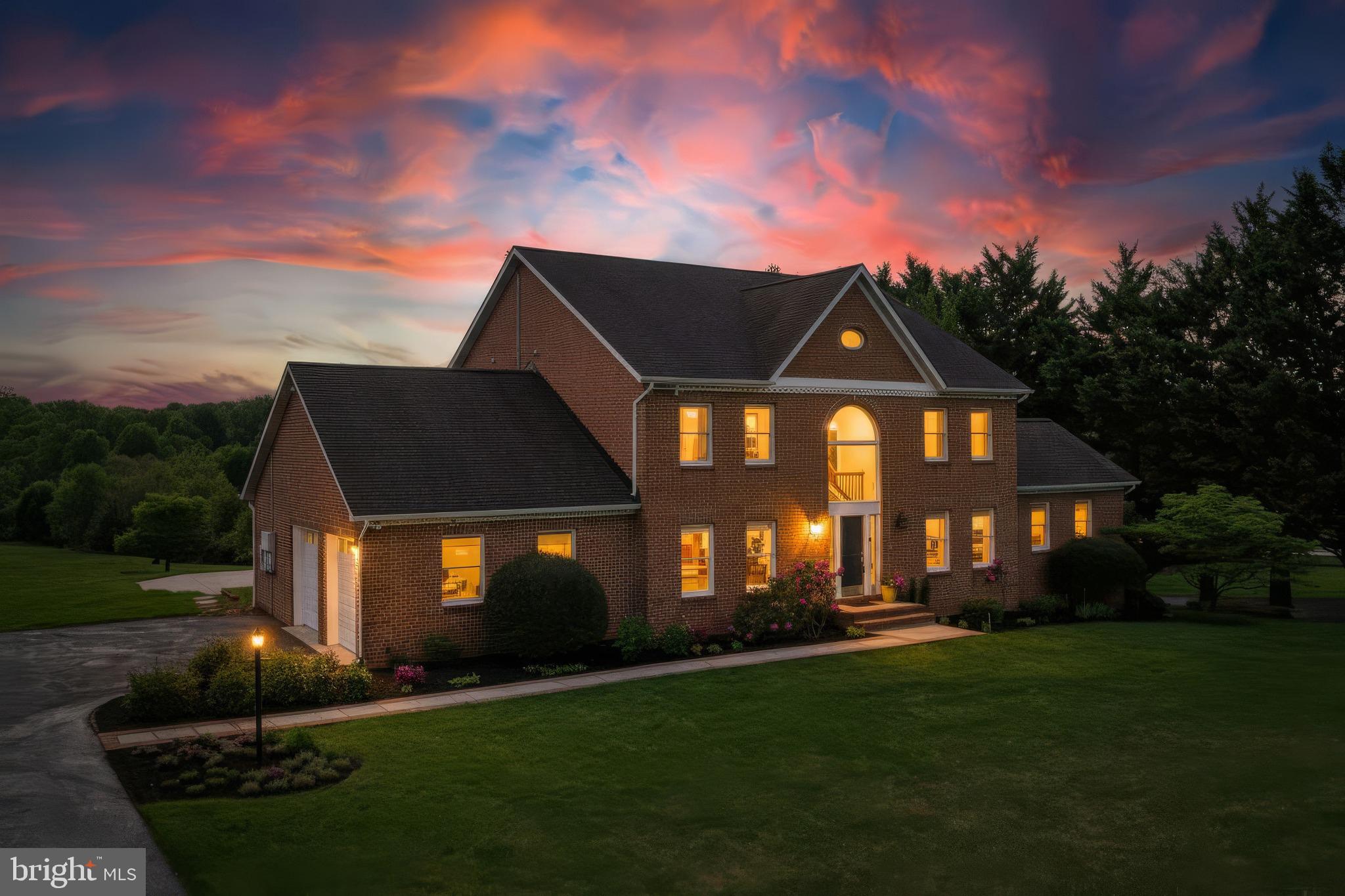 Spectacular 3-Acre Masterpiece in the coveted Twelve Hills community – Where Modern Elegance meets Pastoral Charm.   
Experience the pinnacle of luxury in this impeccably updated all-brick custom estate on a breathtaking 3+ acre lot. This sun-drenched, energy-efficient home features a high-performance solar system and a south-facing rear orientation for optimal natural light.
The Heart of the Home: A magnificent, newly renovated kitchen boasts floor-to-ceiling solid wood cabinetry, premium quartz countertops, a vented hood, and a dramatic breakfast room with soaring ceilings, a French door opening to a large patio, and a semi-circular wall of windows for the picturesque views of your private oasis.
The family room showcases an exquisite stone fireplace, walls of glass, and 2nd set of French doors leading to expansive decks, a gazebo, and a fenced rose garden for relaxing and entertaining.  
Upstairs, retreat to the primary suite with an amazing spa-like bath. All 4 spacious bedrooms offer unrivaled views, so do the 3 new opulent baths. 
The finished walk-out lower level serves as a self-contained space with a 5th bedroom/4th full bath in-law suite, wet bar, media room with tray ceilings, and a 2nd private home office with wall shelving, great for work from home.
The Grounds: Beautifully landscaped with flowering trees, perennials, and vegetable gardens, the vast, flat yard presents unlimited potential for recreation. 
Located minutes from top-ranked schools (River Hill High, Folly Quarter Middle, and Dayton Oaks Elementary), shopping centers, and major routes to DC/Baltimore.