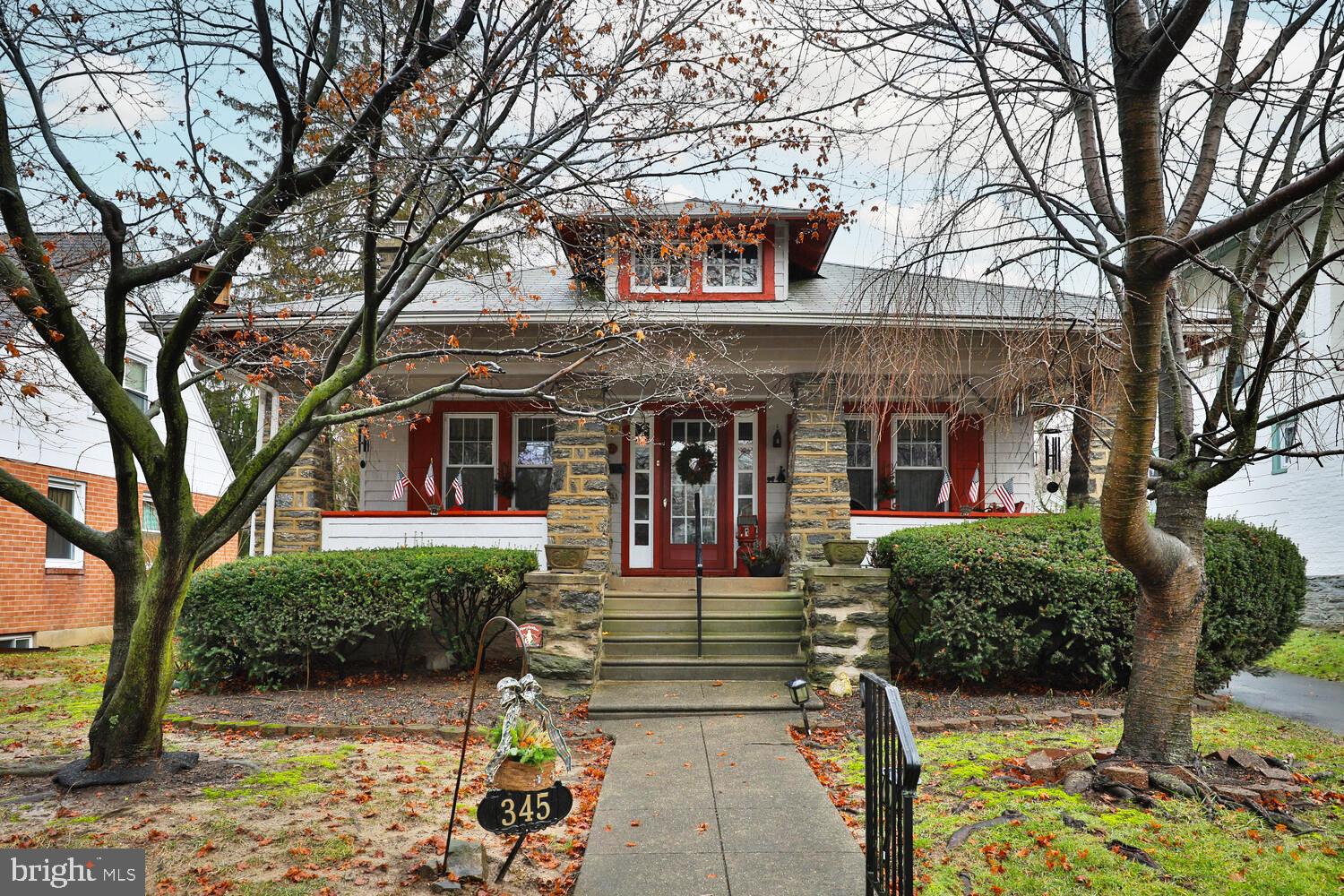 Fantastic opportunity to live steps from Keswick Village in a charming Craftsman style home that is so warm and cozy, you will want to move right in!  The welcomng  Glenside front porch leads  to spacious living room with stone woodbburning fireplace, formal dining room and eat in kitchen with oak cabinets. Two charming bedrooms and full bath are located to the left of the dining room.  Off of the kitchen is a wonderful screened porch with exit to fenced back yard and a 1 car garage.  The washer and dryer are also located off the kitchen (no trips to the basement for laundry) as you enter steps to the full basement where you will find a half bath.  The basement is waterproofed and certainly could be finished. Hardwood floors throughout, replacement windows, ceiling fans and split system a/c in living room.  Just steps to 2 train stations, the bus and Keswick Village shopping and theater.