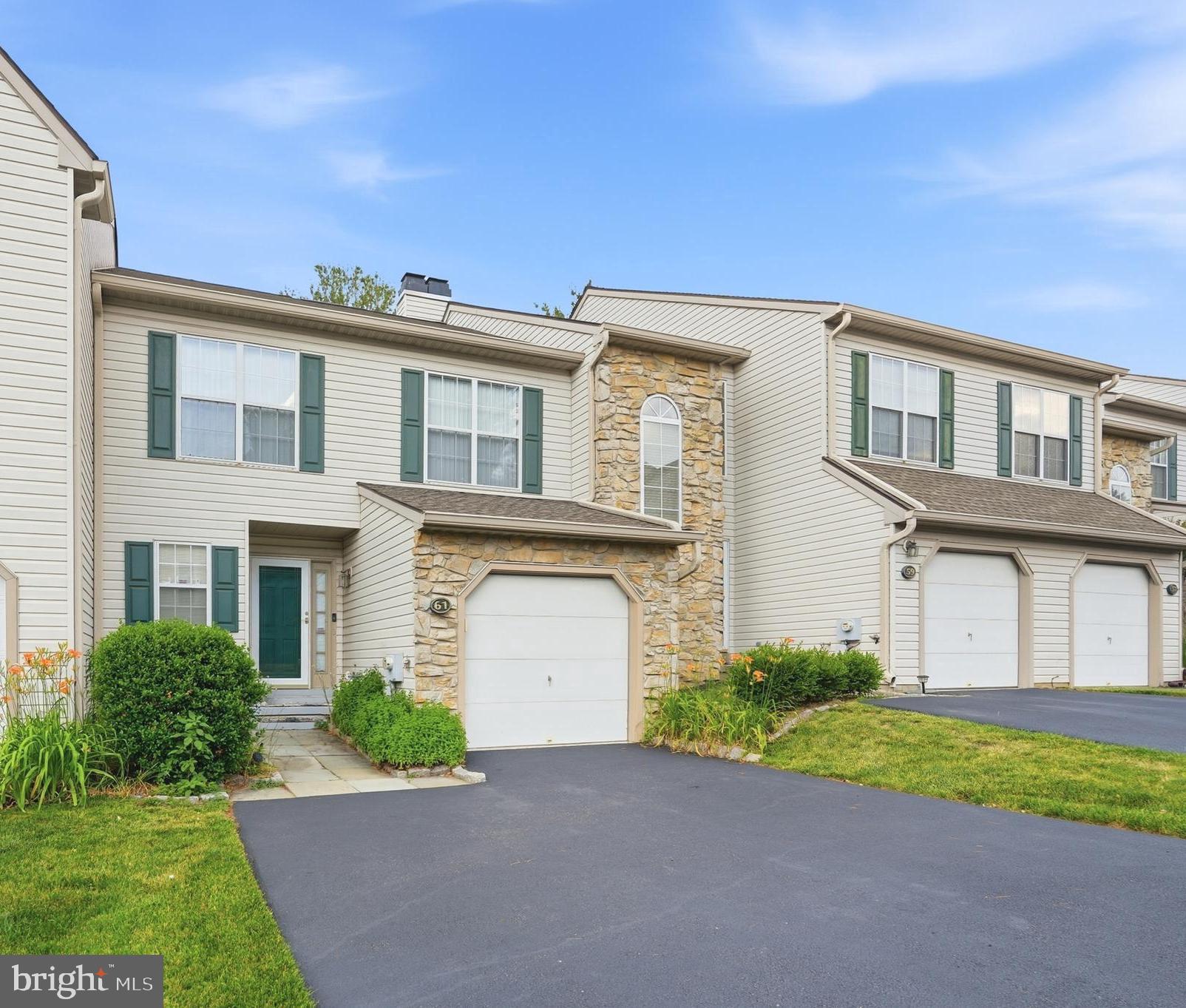 Welcome to 61 Hampton Ct!  As you enter you will notice the spacious open floor plan with lots of natural light and a fireplace for chilly nights.  Kitchen is open to the  dining room and living room which is perfect for entertaining! Kitchen features white cabinetry with black/white appliances and plenty of counter space.  Sliding glass doors lead out to a large deck where you can set up your own oasis.  A powder room is also located on this floor for your convenience

Upstairs, you have 3 generously sized bedrooms. The primary bedroom has a walk-in closet and the primary bathroom features dual sinks, a shower stall, and a garden tub.  An additional full bathroom is also located on this floor. 

Finished basement area can be used as an additional living space, den, playroom, workout area, or whatever you would like.  Make your appointment today!