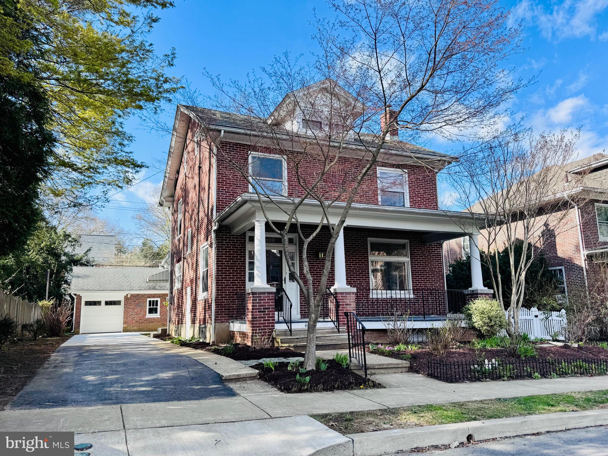 Fantastic Governor Mifflin Schools Colonial Revival/American Foursquare variation large all brick single situated on a lovely lot in the beautiful and ultra convenient Lynoak neighborhood in the heart of Shillington. This beauty has just been rehabbed from top to bottom and is in absolute move in condition and is loaded with charm & character! All of the exposed hardwood floors in the living room, dining room and 2nd floor bedrooms have been beautifully refinished! The main level features a large living room with stained glass windows surrounding the brick non-functioning fireplace, a formal dining room,  a brand new gorgeous 21 handle kitchen with granite countertop, gray ceramic subway tiled backsplash, new stainless steel electric range/oven, microwave, dishwasher and luxury vinyl flooring. Completing the main level is the newly added and super convenient laundry/powder room with space for a full size stackable washer & dryer. Level 2 has 3 generously sized bedrooms and a brand new spacious full bath with ceramic tiled floor and tub surround. Level 3 is the huge fully finished attic 4th bedroom with new wall to wall carpeting and a spacious walk-in closet. The lower level basement is a nice size finished rec/family room with an additional room that could be a 5th BR or den/office/bonus room. Heading outside you have a large covered front porch with stately columns, a newly poured rear patio for cookouts and relaxing along with the large yard with mature trees providing shade and some privacy. For the car enthusiast there's a spacious oversized 408 sqft all brick 2 story, 1 car garage that is sized for 2 cars but has only one door with an opener but has plenty of room for 1 car, motorcycles, bikes and/or a workshop. Level 2 of the garage provides additional storage and has a pulldown stairs for access. No parking worries with the newly expanded and newly paved long driveway with parking for about 4-6 cars. Additional upgrades & updates include an architectural shingle roof, double pane replacement windows, new 200 AMP electric service, new panel, new outlets, new switches and a lot of new wiring throughout and an active radon system. The efficient modern summer/winter boiler was recently cleaned and serviced. Enjoy the fireworks during Community Days which is just a block away right from your yard or front porch . So convenient to schools, shopping, medical, restaurants and major roads. Make this special turn-key beauty your forever home today!