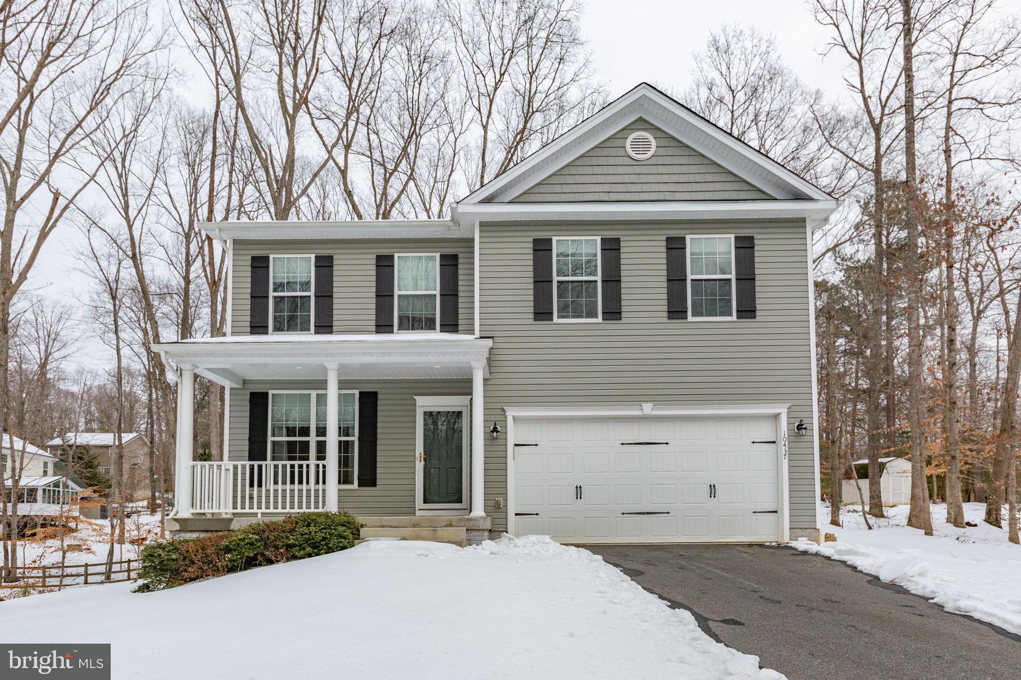 Welcome to your dream home in the highly sought-after Presidential Lakes community in King George —a tranquil, naturally scenic neighborhood known for its peaceful, wooded setting and exceptional amenities. This stunning 4-bedroom, 2.5-bath Colonial offers classic charm and modern comforts, perfectly situated in one of the area's most desirable locations. This home features a brand new roof, all new siding and new carpet throughout.  Step onto the welcoming front porch and enter to find an elegant formal dining room with gleaming hardwood floors. The gourmet kitchen impresses with its own hardwood flooring, recessed lighting, a convenient central island, stylish appliances, sleek granite countertops, and abundant cabinet space. Adjacent, the spacious living room offers plush carpeting, a ceiling fan, and a striking custom accent wall complete with built-in shelving, while a handy powder room completes the main level.
Upstairs, the luxurious primary suite features soft carpeting, a ceiling fan, and a private en-suite bathroom boasting a double vanity, deep soaking tub, and separate stand-up shower. Three additional generously sized bedrooms, all carpeted, share a second full bathroom equipped with a double vanity and a combination tub/shower.
The unfinished basement presents excellent potential for future customization, with ample space to create additional rooms, a recreation area, or extra storage. It includes rough-in plumbing for a future bath, an already-installed radon mitigation system, and convenient walk-up stairs leading directly to the backyard. Additional highlights include an attached 2-car garage and a paved driveway. 
Residents of Presidential Lakes enjoy an exceptional array of community amenities, from private lakes (Madison, Monroe, and Jefferson) with boat ramps, a beach area, and pavilions, to a community swimming pool with a separate wading pool, covered picnic pavilions with grills, playgrounds, an open field park, a multi-purpose court, and a community center—perfect for swimming, boating, fishing, kayaking, picnicking, or simply savoring the outdoors.
Seller has paid full HOA fee for the year.
Don’t miss this wonderful opportunity to own a lovely home in a vibrant, amenity-rich community. Schedule your private showing today!