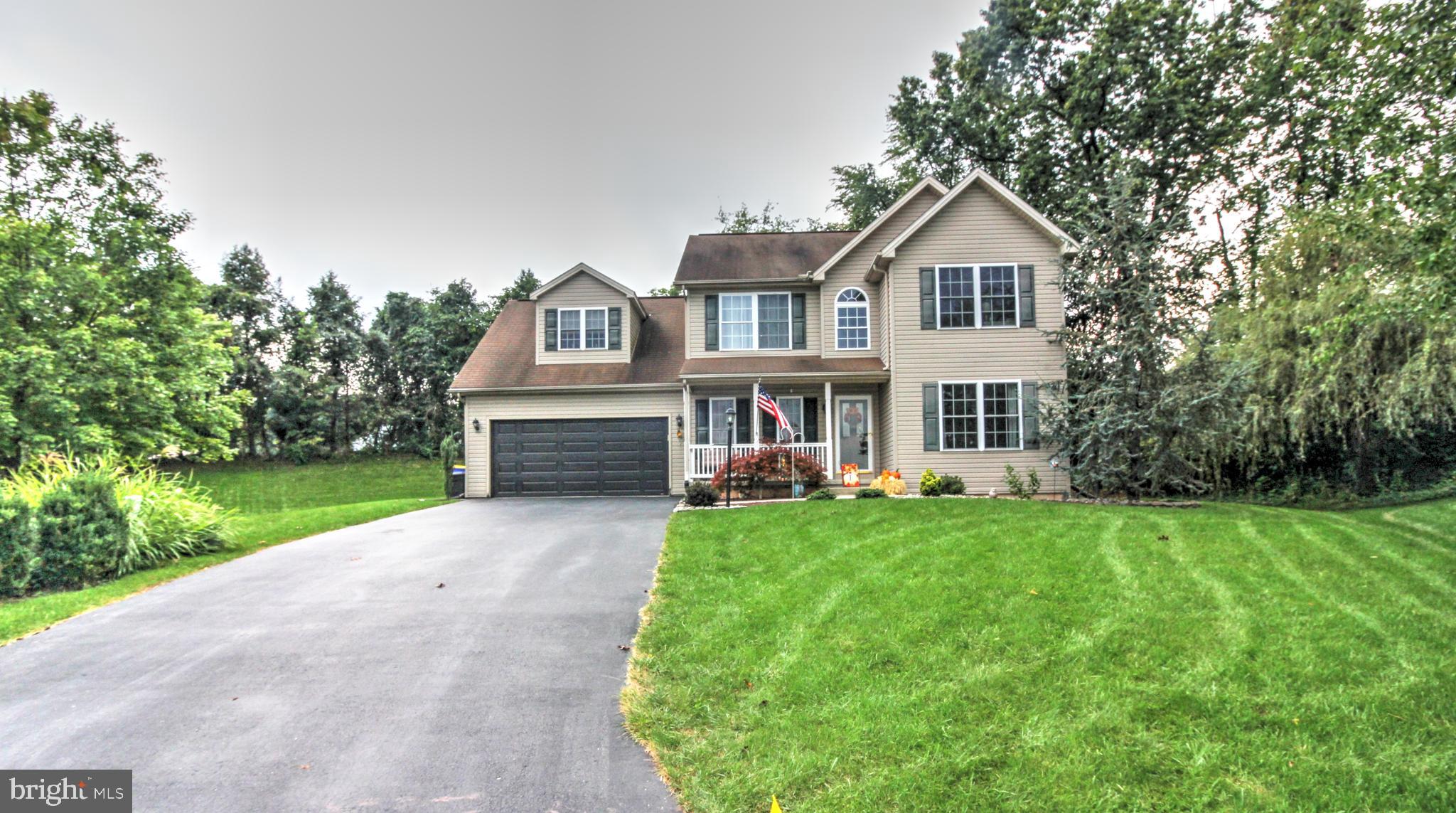An incredible home! Cul-de-sac setting on a quiet street, with no homes to your rear; a  private yard, and beautiful landscaping.  Located  between York & Harrisburg. Covered front porch leads to hardwood Foyer and Powder Room. French doors open into your very own work -from -home Office.  Dining Room  features crown molding and hardwood floor. The Kitchen has tons of counter space: with a tiered breakfast bar and ceramic tile leading to an informal dinner area and a door to a huge deck/private yard....Living Room  has hardwood floor and a propane fireplace. 4BR, 2 full baths, and 2 half baths. Primary Bedroom has a pretty tray ceiling, a WIC, and an ensuite Bath. New carpet.  2nd floor laundry. Finished Lower Level includes an additional half bath with plank flooring,  and a Bar with a rough in for wet bar.