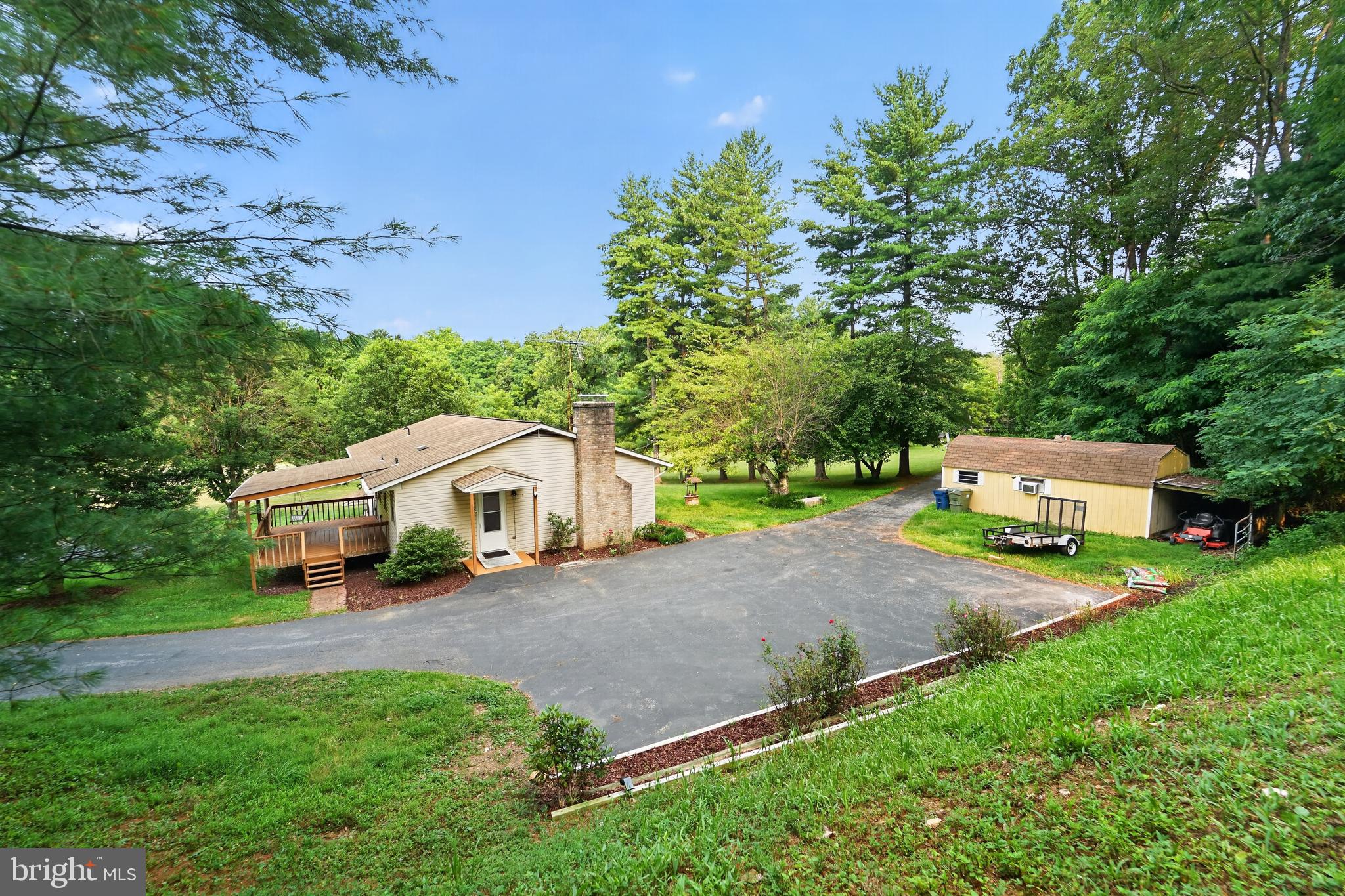 Welcome to 3327 Niner Road, where peaceful country living meets comfort, flexibility, and opportunity. Set on approximately 5.8 beautiful acres in sought-after Finksburg, this charming property offers the perfect blend of privacy, open space, and convenience.

Inside, you'll find warm and inviting living areas with a combination of hardwood floors and carpeting, a cozy fireplace, and a spacious layout designed for everyday living. The kitchen opens to a deck overlooking the scenic property — the perfect spot to enjoy your morning coffee, entertain guests, or simply relax and take in the tranquil countryside. The home is far larger inside than it appears from the outside.

The finished lower level includes a private outside entrance, making it ideal as an in-law suite, guest apartment, home office, recreation area, or potential income-producing space. Carroll County currently permits accessory dwelling units (ADUs) with certain restrictions, provided the owner resides on the property. Maryland's new ADU law (House Bill 1466 / Senate Bill 891), passed in 2025 and taking effect October 1, 2026, will allow a second independent living space on the same property as the main house. Buyers should confirm current requirements with Carroll County.

The expansive acreage offers endless possibilities. Whether you've dreamed of keeping horses, farming, gardening, or simply enjoying wide-open spaces, this property gives you the flexibility to create the lifestyle you've always wanted. With plenty of room to roam, it's a rare chance to enjoy country living while remaining just minutes from shopping, restaurants, commuter routes, and top-rated Carroll County schools.

An excellent opportunity for an estate property or long-term planning.

If you're looking for privacy, versatility, and the beauty of rural Maryland with every convenience close at hand, look no further.