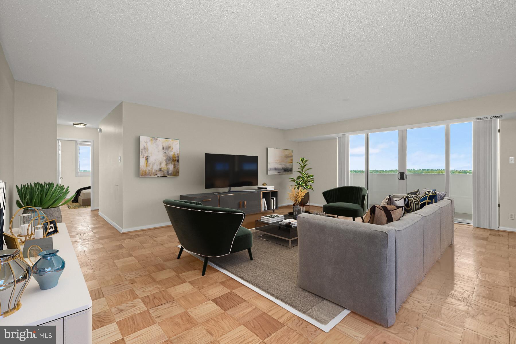 Enjoy the best view in the building and the gracious living standard of the elegant Elizabeth.  This lovely home is fresh, bright, and beautiful.  It features a flowing floor plan, hardwood floors, updated kitchen and bathrooms, abundant closet space, and captivating views from the 17th floor balcony.  The ample floor plan (1,300+ sf) affords many lifestyle and layout options.   All room sizes run large.  During warm weather, the 16' balcony on the shady side of the building is the perfect place to hang out.  Cold-weather options are quite inviting too, with the fitness center, indoor pool, sauna, and party room heading the list (entertain up to 49 guests).  Whole Foods is 3 blocks away, Amazon Fresh 6 blocks,  Friendship Heights Metro 6 blocks.  Condo fee includes all utilities, 1 garage parking space, and 24-7 front desk.  Ample guest parking (surprise!).  Pet friendly community. The Elizabeth is a well-appointed, well-managed building with a pleasant staff.  People love living here.  Just ask the residents.