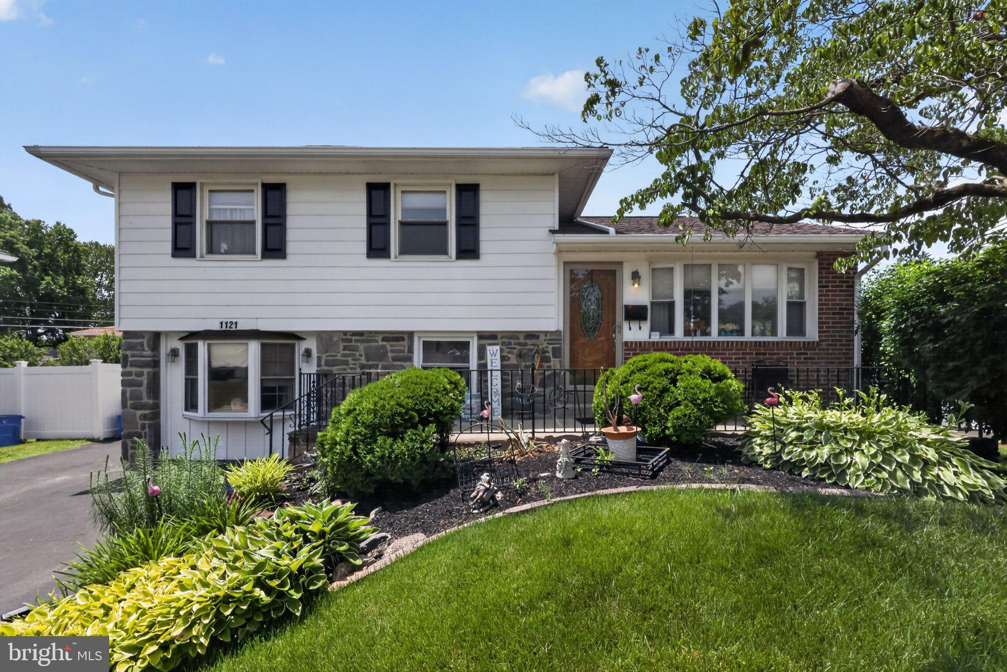 Welcome home to this charming split-level in the heart of Secane! Lovingly cared for by its owners, this home offers a wonderful combination of comfortable living space, thoughtful updates, and a convenient location.

The main level features a bright living room, an open kitchen and dining area perfect for everyday living and entertaining, and a sunny bonus room overlooking the fully fenced backyard, ideal spot to enjoy your morning coffee or unwind at the end of the day.

Upstairs, you'll find three comfortable bedrooms and a full hall bath. The lower level provides even more living space with a spacious family room, a fourth bedroom, a full bathroom, and a laundry room. Just think of the possibilities; guests, a home office, or multi-generational living.

Recent updates include a new roof (2006) and water heater (2021), giving added peace of mind. Outside, the generously sized driveway offers plenty of parking, while the fenced backyard provides space for pets, play, gardening, or outdoor gatherings.

Conveniently located within walking distance of the train station and close to the YMCA, local parks, shopping, dining, I-95, and the Blue Route, this home offers the perfect blend of neighborhood charm, indoor comfort, outdoor enjoyment, and easy commuting.

Don't miss your opportunity to make this well-maintained Secane gem your next home!