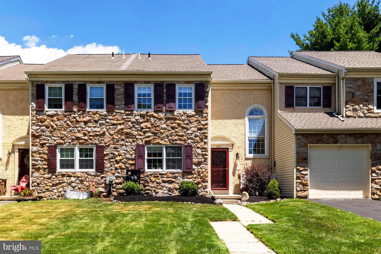 Welcome to this beautiful stone-front townhome located in the highly sought-after Dublin Meadows community in Upper Dublin Township. A dramatic two-story foyer welcomes you into a thoughtfully designed floor plan featuring an elegant living room and dining room accented with classic wainscoting and crown molding. The fully equipped kitchen offers granite countertops, wood cabinetry, gas cooking, and a comfortable dining area, making it ideal for both everyday living and entertaining. Adjacent to the main living spaces is the family room with French doors leading to the wood deck—perfect for outdoor dining, relaxing, and entertaining guests. The second floor features two generously sized bedroom suites. The primary suite includes a double-sink vanity, jetted soaking tub, and separate stall shower. The second bedroom also enjoys its own full bath with tub/shower combination and vanity, providing excellent comfort and privacy. The lower level offers a full basement with a Vevor wall heater, providing additional storage and flexible space for future finishing. Located within the award-winning Upper Dublin School District, this home is conveniently situated near shopping, dining, fitness centers, and major commuter routes. This exceptional townhome combines comfort, style, and convenience in one of Upper Dublin's most desirable communities and covered by an AHS Shield Essential 1 Year Home Warranty. This home has a brand new roof just recently installed. Don't miss this opportunity to make it your own!