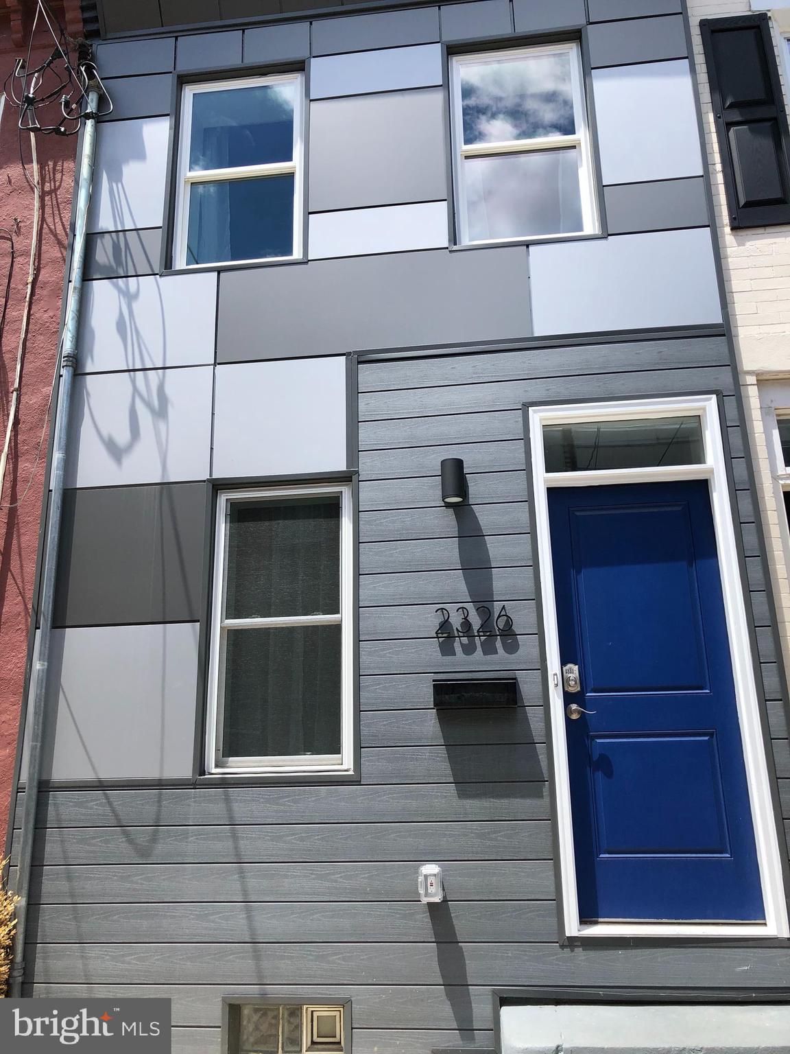 This is another fantastically Rehabbed property in a prime Fishtown Location. The workmanship is impeccable! Located 1/2 Block off East York  St your just steps away from shopping, dining etc, and you have  easy access to major highways.  As you walk into the home, you are greeted with an urban feel of exposed brick walls and new hardwood floors.  The kitchen is all brand new with stainless steel appliances, Quatz countertops, a beautiful backsplash and shaker cabinets.  Conveniently located on the 1st floor is a discretely tucked away Half Bath, coat closet and 1st floor laundry.  The back yard is EXTRA spacious!  The 2nd floor boosts 2 Bedrooms and Full Bath. All hardwood floors on this level as well. The bedrooms both have ceiling fans. Large full clean basement has lot of great storage. All appliances and mechanicals are NEW!  New W/D, HVAC, Water Heater,  electrical, plumbing, roof and all kitchen appliances including Refrigerator, dishwasher, microwave and oven.