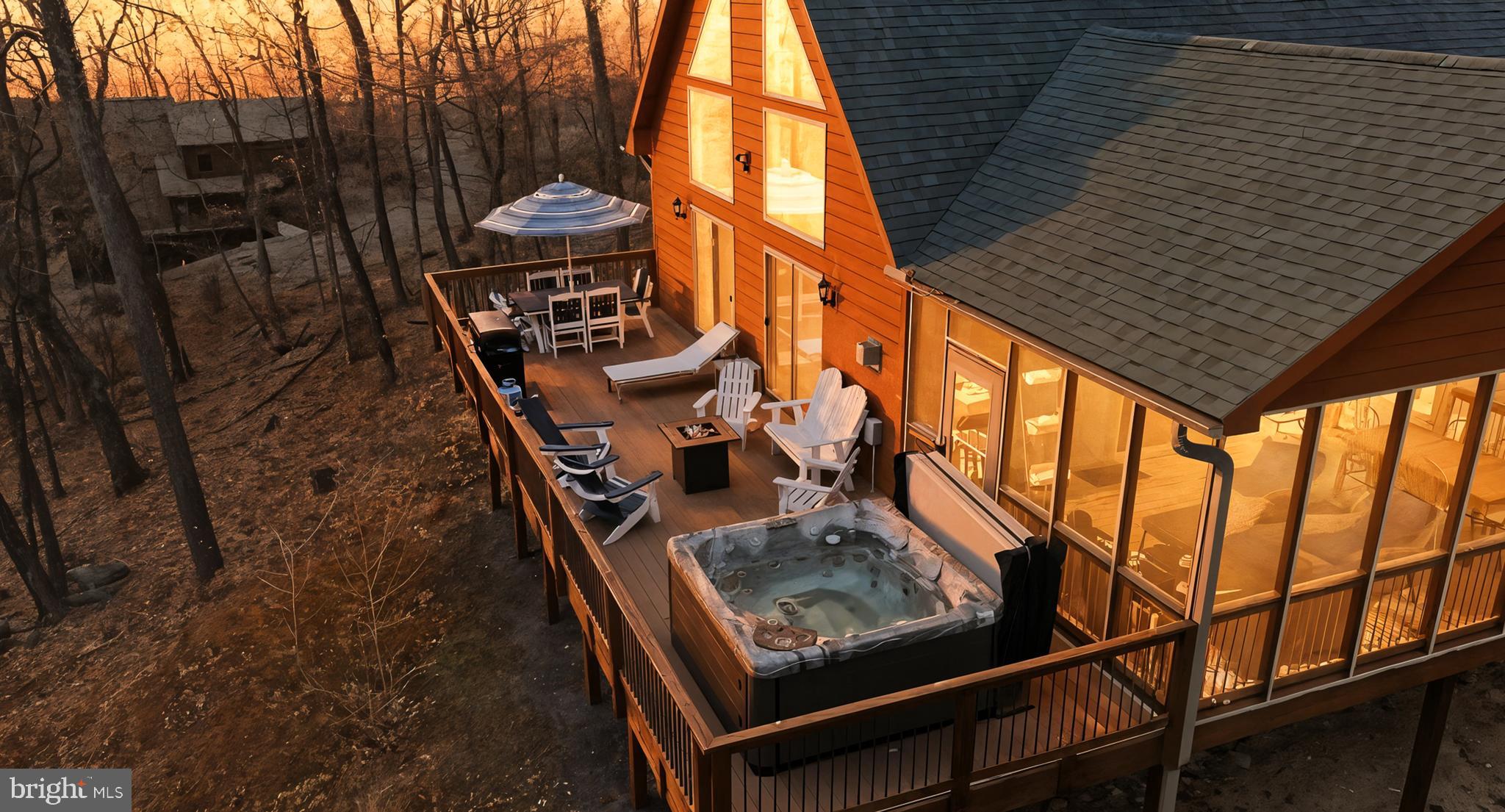 Newly constructed, stunning, 4-bedroom, 3.5-bath home built in 2019, nestled in the tranquil Coolfont Mountainside Community. 
Inside you will find unique and natural aesthetic cedar walls, upgrades such as Hickory wood floors, 2 fireplaces, fully finished basement, soaring ceilings that create a bright and airy atmosphere, showing off the gorgeous WV wooded and mountain views! In the kitchen you will find an upgraded kitchen with high end appliances and generous quartz counter space. 
Outdoors, you'll find a cozy screened in porch, and large deck. Most furnishings to convey including the hot tub! This property is currently a successful vacation rental, but would make a great full time residence as well. Community offers heated inground pool, hot tub, kiddy pool, tot-lot, tennis court and basketball court as well as on site hiking trails that lead to the Cacapon State Park. Peace and serenity are waiting for you at this home!