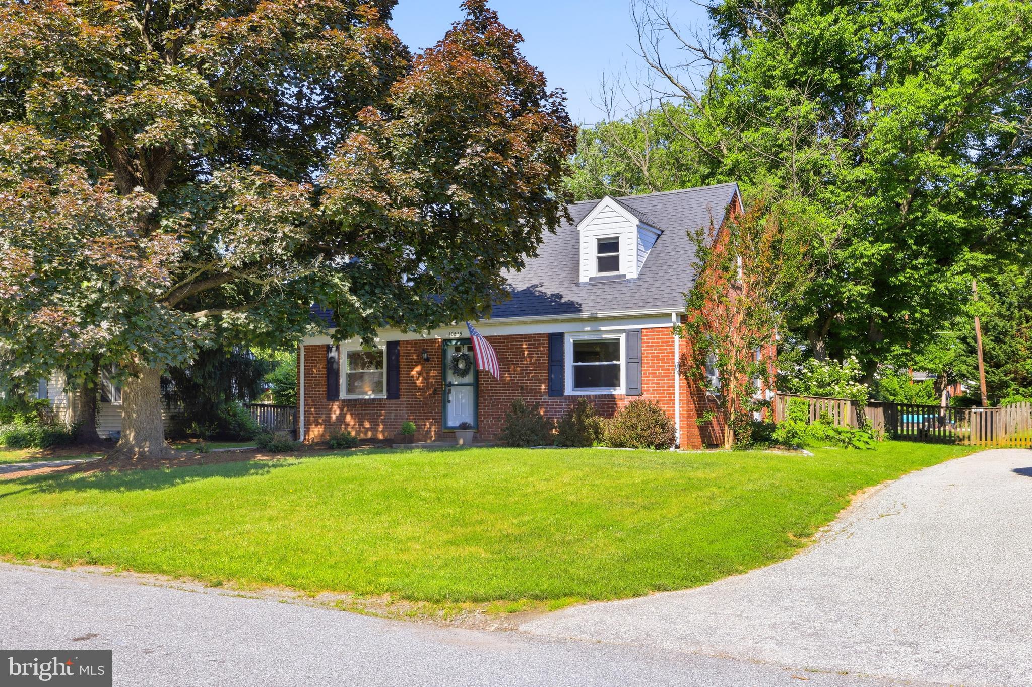 Fantastic all-brick Cape Cod on a no-through street in Cockeysville!! This 3 bedroom, 1 bath home offers hardwood floors, a bright living/dining area, updated kitchen with stainless steel appliances, and two main-level bedrooms. The upper level features a spacious bedroom plus bonus sitting room, perfect for an office, dressing area, nursery, or retreat. The partially finished lower level adds extra living space, laundry, storage, and walkout stairs. Enjoy the enormous fenced, level yard with patio, fire pit area, shed, and exterior lighting. Major updates include architectural shingle roof 2013, HVAC 2026, water heater 2025, heating system 2021, refrigerator 2022, dishwasher 2018, LVP flooring, and patio/fire pit area 2021 & MORE! Move-in ready and full of charm!