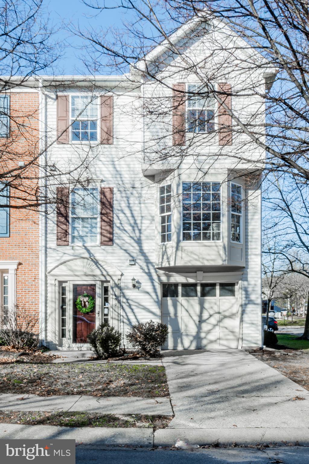 Welcome to 8600 Otter Creek Road. This gorgeous townhome is nestled in the always desirable Russett community.  This 2351 square foot home offers 3 bedrooms 2 full bathrooms and 2 half baths, huge eat in kitchen, open living/dining, top floor laundry. The entry level offers large entry with powder room and bonus room with  fireplace. Fully fenced backyard. The master suite offers vaulted ceilings,  ensuite and walk in closet. This beautiful home has large windows including two bay windows and is filled with lots of natural light. 8600 Otter Creek Road has been lovingly maintained and upgraded.  New roof 2019, new appliances 2020, new flooring 2024, new skylight 2024, new shower in master bath 2023, all new faucets 2023, new flooring on stairs leading up from entry level to the main level and entire main level 2023. Enjoy outdoor living at its best with neighborhood pools, tot lots ,tennis courts, basketball courts, volleyball courts, picnic pavilions and over 14 miles of hiking trails. The Russett community is the perfect place for your family and friends to spend time relaxing or exploring the Oxbo Nature Preserve. Convenient to Restaurants, shopping, DC, Baltimore and Annapolis.