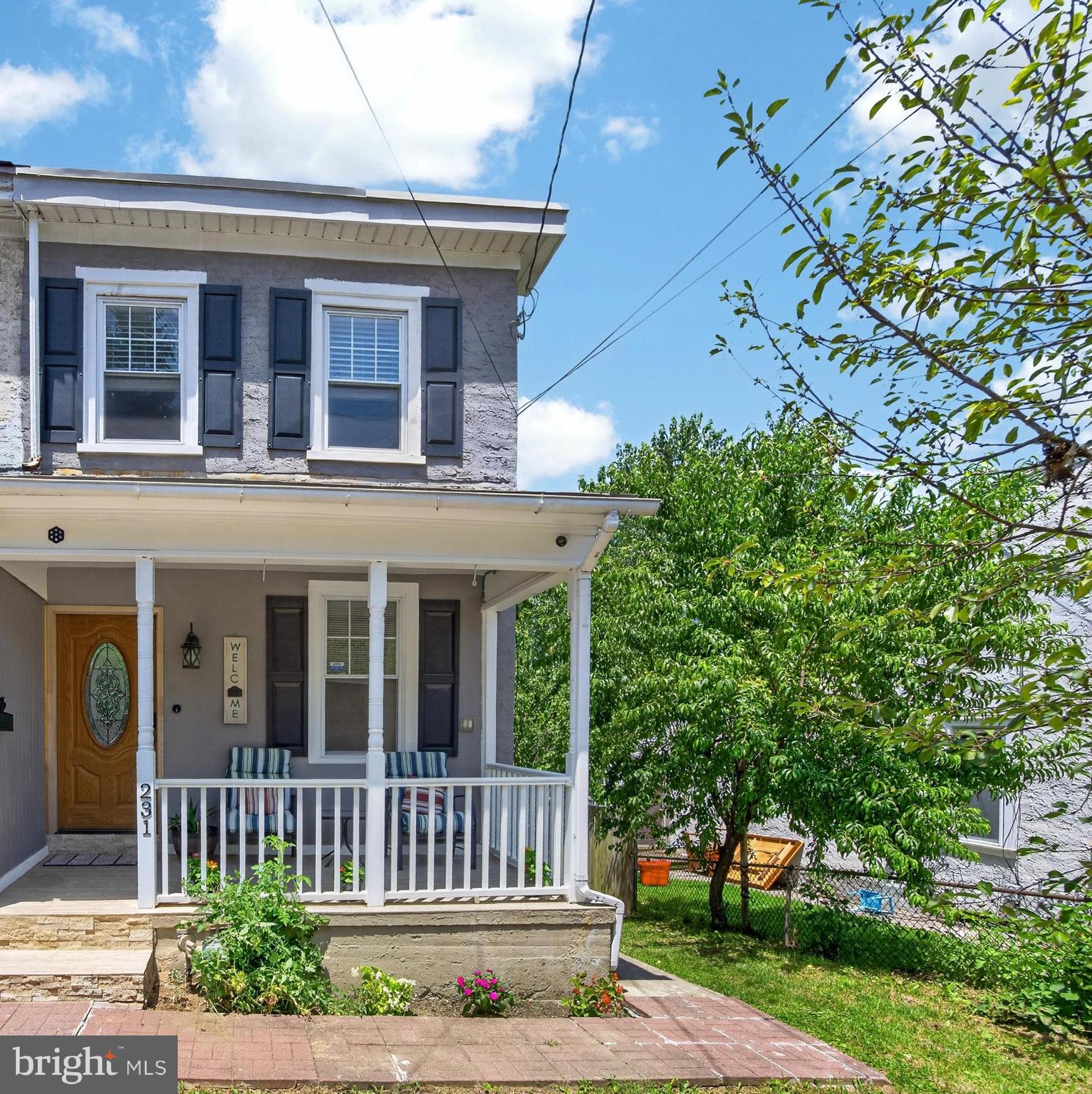 Welcome to this beautifully updated 3-bedroom, 2 full bath Twin located in the award-winning Downingtown Area School District. Filled with natural light and move-in ready, this charming home offers the perfect blend of character, modern updates, and convenience.
A welcoming covered front porch leads into a bright, open floor plan featuring spacious living and dining rooms with an abundance of windows that fill the home with natural light. The updated eat-in kitchen is both stylish and functional, offering attractive cabinetry, a decorative backsplash, porcelain tile flooring, stainless steel appliances, gas cooking, and plenty of cabinet and counter space. An updated full bathroom completes the main level.
The second floor features the primary bedroom and a second updated full bathroom. The finished third level includes an additional bedroom plus a versatile bonus room that's perfect for a home office, playroom, nursery, or hobby space.
The finished walkout basement is home to the third bedroom and also provides additional storage and direct access to the backyard.
Step outside to enjoy the level, fenced backyard complete with fruit trees and access to two off-street parking spaces from the rear alley. Major updates include replacement windows throughout, updated flooring, an updated kitchen, and renovated bathrooms, making this home truly move-in ready.
Ideally located just a short walk to downtown Downingtown, the Downingtown Train Station, local restaurants, shops, parks, and community events, this home offers the best of small-town living with easy access to major commuter routes. With so many big-ticket updates already completed, this is a home you won't want to miss.