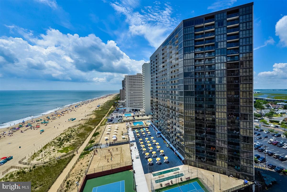 This condo boasts a range of recent upgrades, including a new HVAC system and washer/dryer, both installed in 2023 while the water heater was replaced in 2019. The attention to detail extends to the insulated ductwork, providing a comfortable and climate-controlled environment for owner and guests alike.
Step into the master bedroom, where you'll find Hunter Douglas Vertiglide blinds that not only enhance the aesthetics but also serve as an effective thermal barrier. These blinds contribute to maintaining an ideal temperature throughout the year, ensuring a cozy retreat regardless of the season. The thoughtful touches continue with custom drapes in the living room, adding a touch of elegance and personalization to the space.
Practicality meets convenience as the dryer is vented to the outside, promoting efficient ventilation and reducing any potential maintenance issues. Every aspect of Golden Sands 1103 has been meticulously considered, from the essential appliances to the finer details that enhance the overall living experience.
Whether you're seeking a relaxing vacation home or an investment opportunity on the oceanfront, 1103 invites you to indulge in a well-maintained and thoughtfully upgraded property. Enjoy the excitement of Ocean City, with the assurance that every aspect of this condominium has been crafted for your comfort and satisfaction.