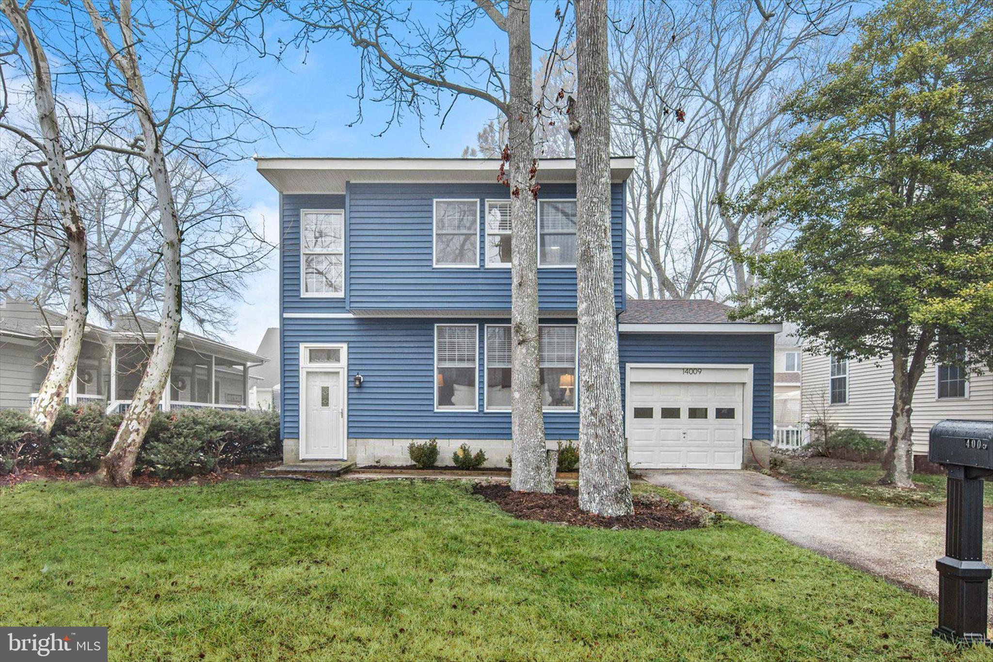 Welcome to your beach retreat in the highly desirable Caine Woods community in North Ocean City. Perfectly suited for year-round living, a relaxing vacation getaway, or a savvy investment opportunity, this updated contemporary beach cottage offers bright, easy coastal living just a few blocks from the ocean. As you enter the home, you are welcomed by a gorgeous two-story foyer that creates an immediate sense of openness. Filled with natural light, the home features a spacious living room with abundant windows and a striking architecturally significant spiral staircase that adds character and a modern aesthetic. The open feel continues into the sunny dining area, where sliding glass doors lead to a deck overlooking the fenced rear yard, an ideal space for outdoor dining, relaxing, or entertaining after a day at the beach. The bright white kitchen offers a clean, coastal feel with stainless steel appliances, quartz countertops, and a convenient breakfast bar for casual meals or morning coffee. Just off the kitchen you’ll find a full bath and a conveniently located laundry area, adding functionality to the main level. Upstairs, the generously sized loft-style primary suite is filled with light and features double closets and a private bath that also offers hall access to serve the two additional upstairs bedrooms. Luxury vinyl plank flooring runs throughout the home, providing both durability and a stylish coastal aesthetic. Additional highlights include an attached garage and driveway, offering ample off-street parking as well as additional storage space for all of your beach gear. Located in the popular Caine Woods neighborhood in North Ocean City, this home offers easy access to some of the area’s best dining, shopping, and entertainment, with the beautiful beach just a short stroll away. With its bright interior, charming design, and unbeatable location, this property is an ideal coastal escape, primary residence, or investment opportunity.