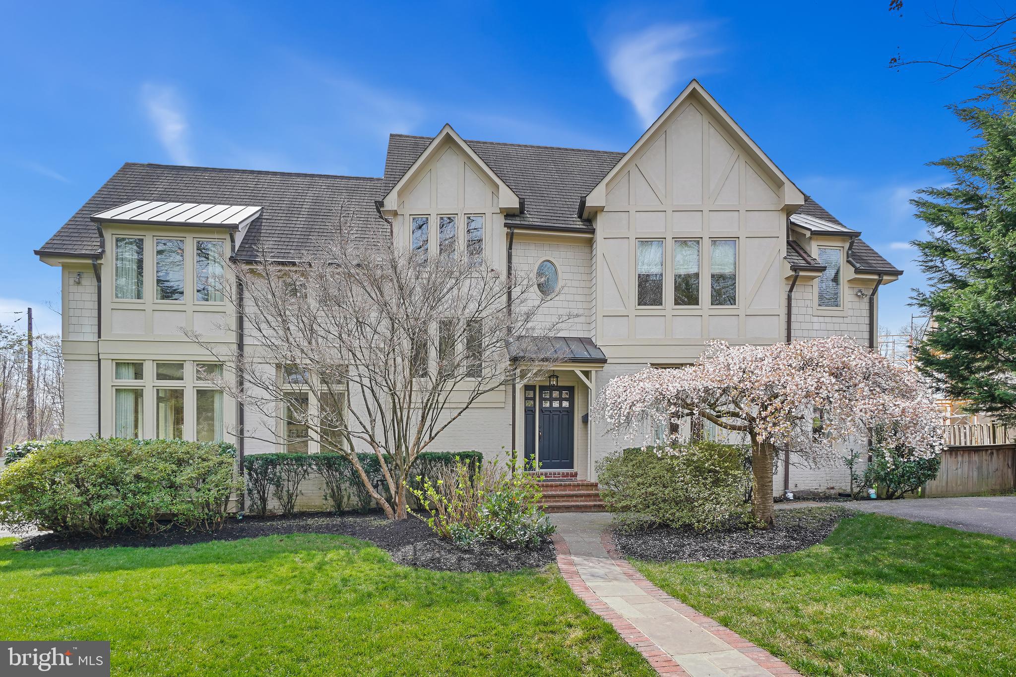 Welcome to 5400 Moorland Lane in Edgemoor, the most sought after neighborhood around thanks to its proximity to Downtown Bethesda. Walking into this Edgemoor home, you will immediately notice all the natural light thanks to the big, beautiful windows throughout. The main level boasts a living room, dining room, butler's pantry with wet bar,  a kitchen with a large island and walk-in pantry, and a family room where everyone will gather day and night, with it's incredible windows, ceiling height, natural fireplace, and doors leading out to the bluestone patio where you'll find the fun pergola for a welcoming outside entertainment area. On the 2nd level is the large owner's suite with his and her gracious walk-in closets, and  en-suite bathroom. Three more bedrooms and two baths are down the hall. On the third level are two more bedrooms or what could be two fabulous in-home offices plus a full-size bathroom at the end of the hall. In the large finished lower-level, there is another full-sized bathroom, a laundry room, and a back door to get you outside. This is an incredible opportunity to live in Edgemoor, with The Edgemoor Club just blocks away. Easily walkable to the Bethesda metro, endless stores, restaurants, and all that Downtown Bethesda has to offer. Call Stacey or Jane today!