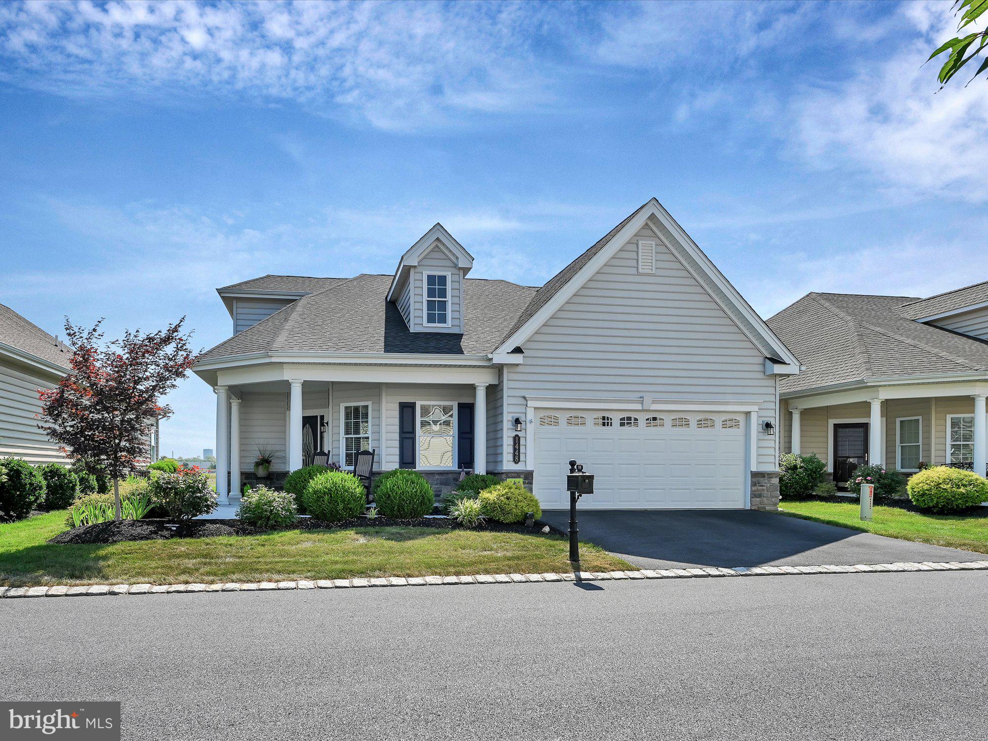 Welcome to the four seasons at Elm Tree! This Private 55+ planned community offers tons of amenities and is maintenance free living at its finest. This gorgeous Traditions of American built 3 Bed/3 bath home has 9' ceilings & beautiful hardwood floors throughout. The great room has large vaulted ceilings that boasts ample sunlight with a large palladium window that over looks the Rapho Twp Park. Out back is a stamped concrete patio located off of the gourmet kitchen that includes stainless steel appliances & pantry. The first floor primary bedroom features a large walk-in closet, custom blinds & primary bath with a double vanity sink, custom walk-in shower with river rock, tile & glass doors. The 2 car garage has diamond plating & work bench. Upstairs is a loft that overlooks the great room, a bedroom & a large walk in attic. This home has lots of upgrades! Don't miss out on this rare find! Book your tour today!