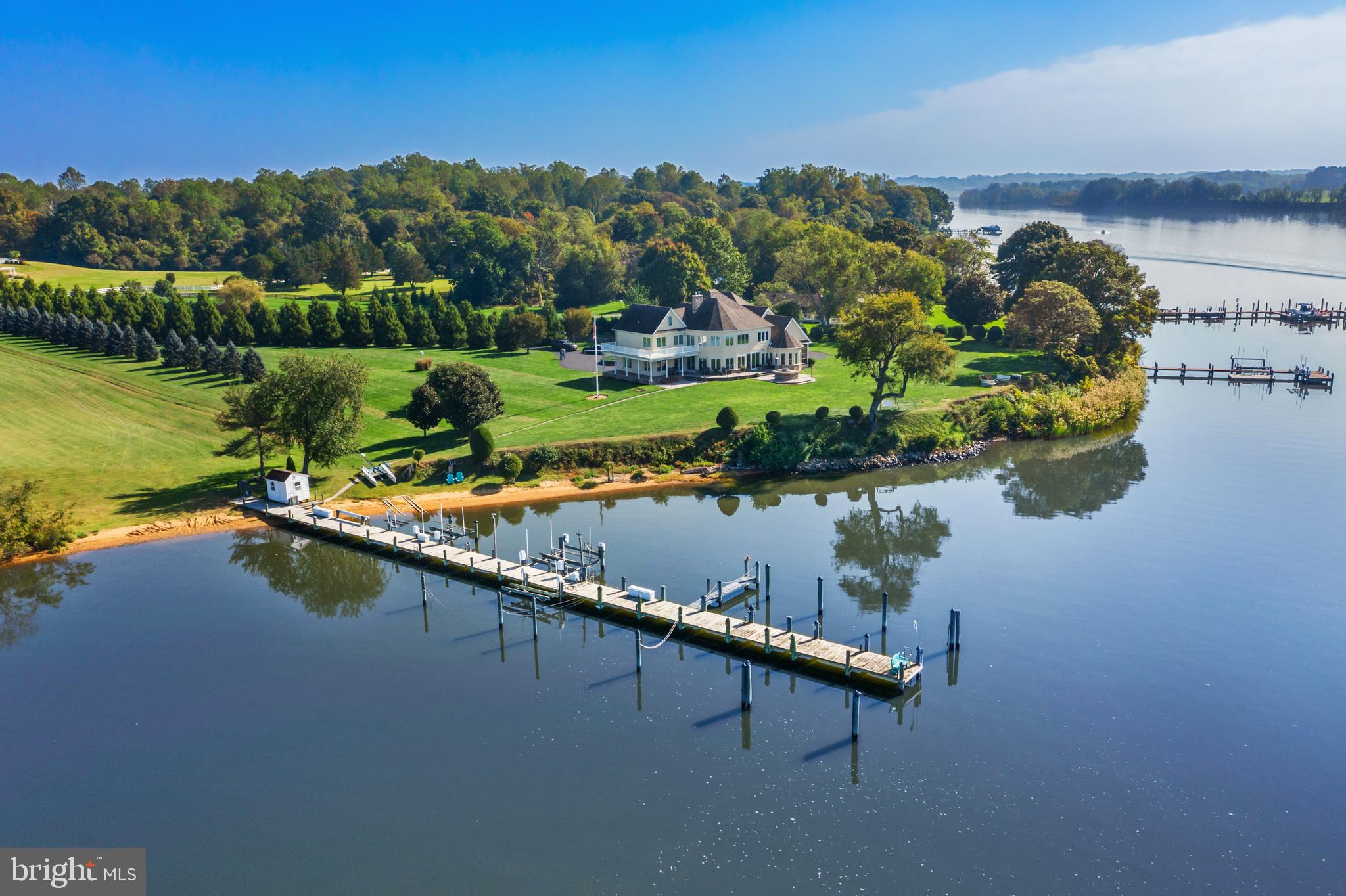 The definition of Location, Location, Location!  One of the most sought after spots on the Sassafras River. 
Unbelievable year-round sunsets, deep water dock with multiple slips, an ideal elevation with easy access to the water,  panoramic water views that seem endless, and a remarkable  well designed, quality built home and guest home with some of the finest materials throughout.  Designed to take in spectacular views of the Sassafras River, most rooms have a wall of windows and glass doors connecting the interior to the outdoor waterfront living areas.  One must see this property and home in person to truly appreciate all that it has to offer.