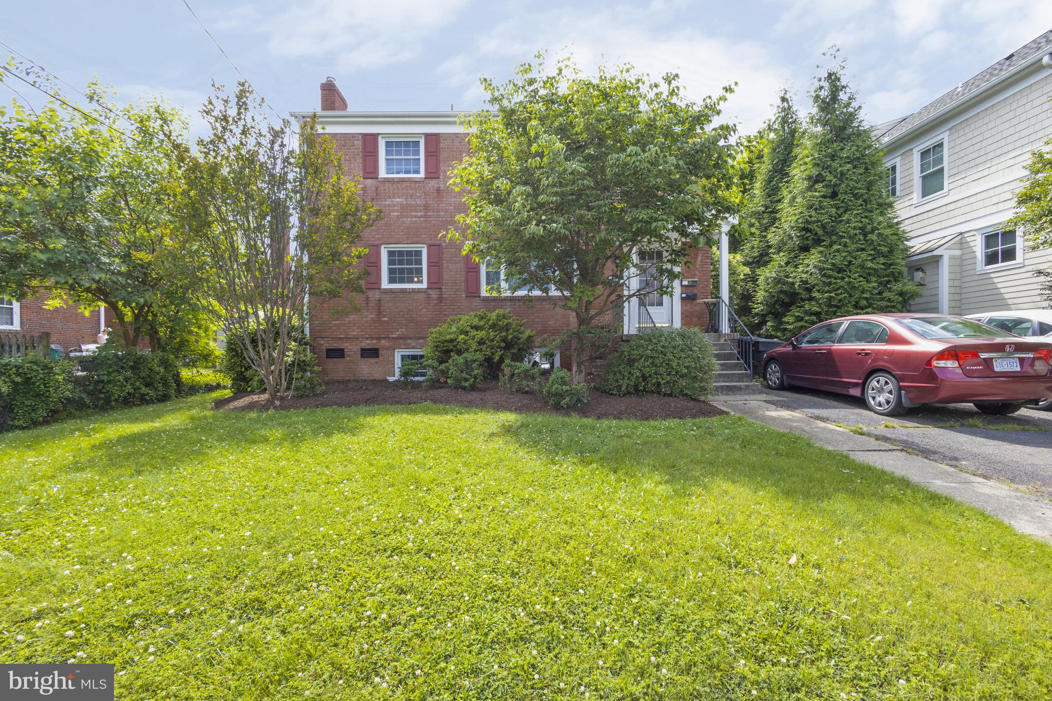 This perfectly located property has an enormous backyard (the lot is 8,602 Sq Ft) and is about a half mile to Clarendon with it's metro stop, restaurants, coffee shops, etc. Fantastic opportunity to own a well-maintained multifamily building with a Total Rental Income of $107,400 Per Year, and an impressive CAP Rate of 5.71%, this property offers dependable rental income and strong tenant demand thanks to its close proximity to the Metro.  The two upper units each have 2 bedrooms, and have been freshly painted. The 2 bedrooms in the basement unit have also been renovated, painted, and have new LVP floor and updated bathroom and kitchen areas, with quartz countertops, white cabinets, and stainless steel appliances. The shared laundry room has 2 sets of washers and dryers and the outside features a giant backyard with a storage shed. There are 4 off-street parking spots.