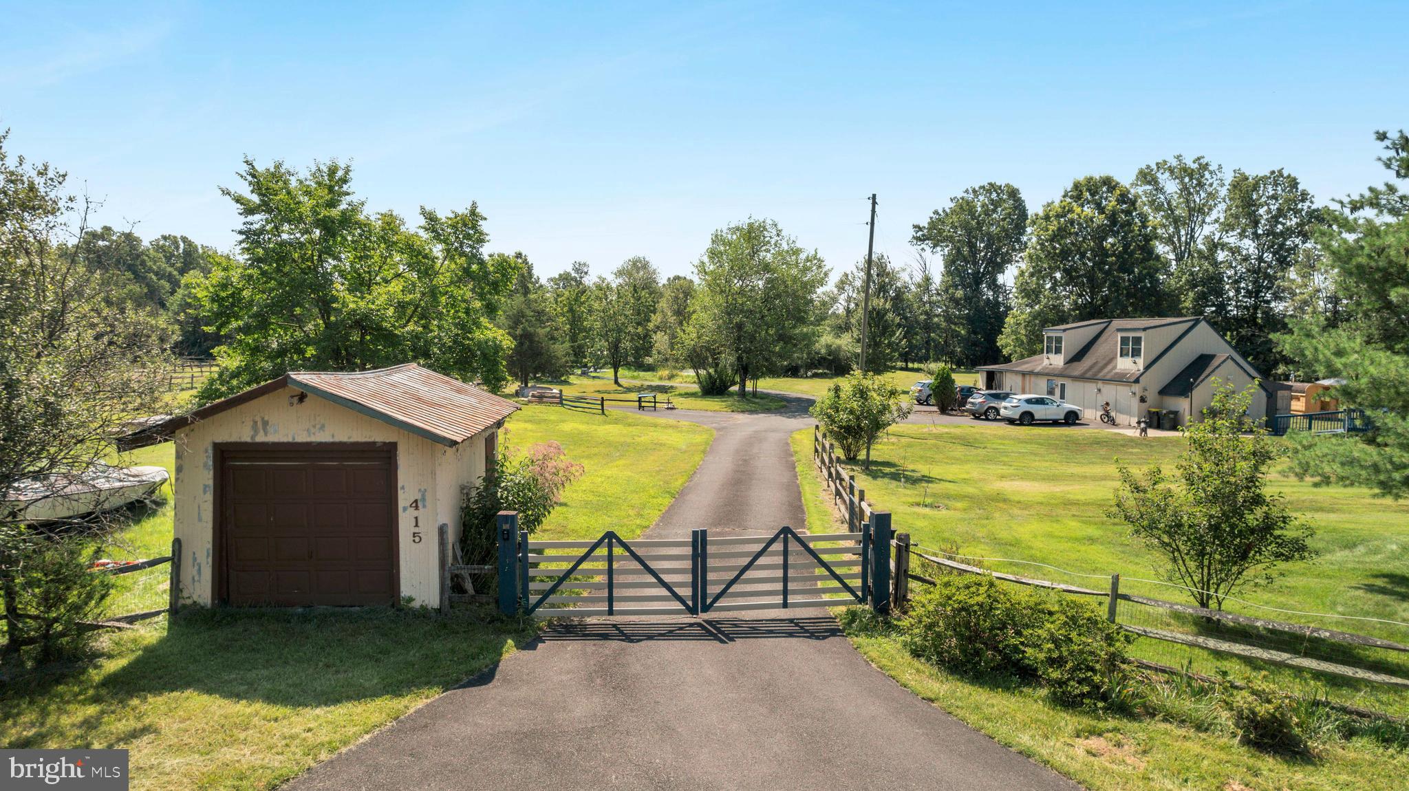Welcome to an extraordinary opportunity to own a private equestrian sanctuary nestled in the sought-after Upper Black Eddy region of Bucks County, Pennsylvania. Set on 11.7 pristine acres of picturesque countryside, this exceptional property blends the timeless beauty of rural living with modern comfort, functional equestrian facilities, and multiple income-generating streams, making it a rare find for both lifestyle seekers and savvy investors.

At the heart of this estate lies a beautifully maintained 4-stall barn, thoughtfully equipped with a spacious tack room, dedicated feed storage, and ample space for hay and equipment. Adjacent to the barn, a professionally designed riding arena and round pen provide ideal spaces for everything from casual rides to serious training. Whether you’re an experienced rider, a trainer, or someone dreaming of running a boutique horse operation, this property is turnkey and ready.

The charm continues with a welcoming 3-bedroom, 2-bath Cape Cod-style home that radiates warmth and character. Designed for comfort and functionality, it features sun-filled living spaces, a modern kitchen with premium appliances and generous prep space, and an inviting all-seasons room that offers peaceful views of the surrounding landscape. A private upstairs retreat serves as the primary suite, complete with its own bath and serene outlooks. A rare addition, an elevator, offers enhanced convenience and accessibility throughout the home.

Step outside and immerse yourself in the tranquil beauty of the land. A scenic pond anchors the landscape, offering a quiet place for reflection, fishing, or picnicking by the water’s edge. The detached garage provides flexible space for storage, workshop use, or hobbyist activities, while the well-maintained grounds include rolling pastures, mature shade trees, and open fields that stretch as far as the eye can see.

This property isn't just a home, it’s a working lifestyle estate with a thriving micro-business model already in place. The current owner generates income through a variety of ventures: stable rentals, private riding lessons, “Day at the Farm” experiences (including fishing, sauna sessions, animal encounters, and picnics), and the sale of handcrafted goods produced from the farm’s animals. With its existing client base and unique offerings, the possibilities for continued growth or expansion are abundant.

Perfectly positioned just 15 minutes from the renowned Bucks County Horse Park, home to countless equestrian events and competitions, this location offers peaceful seclusion without sacrificing access to charming downtowns, boutique shopping, gourmet dining, and major commuter routes.

This is more than a property, it’s a lifestyle, a retreat, and an investment in one of Pennsylvania’s most idyllic settings. Don’t miss your chance to own a piece of Bucks County magic. Schedule your private tour today and explore everything this extraordinary estate has to offer.