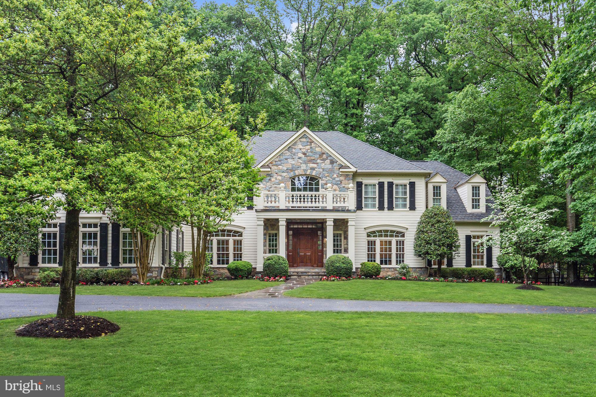 $200.000.00 reduction on this custom designed home built by Natelli Homes. No detail was overlooked. Large rooms, high ceilings and a very "user friendly" floor plan. 5 bedrooms, 4 full baths and an upstairs family room on the second floor. Great first floor with large kitchen, library, sunroom, family room, living room, dining room. Located prior to The Village on almost a treed 1-acre lot.