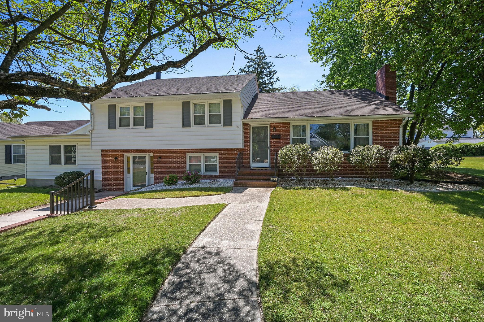 This 4-bedroom, 2-bath home in Harrington has a warm, welcoming feel from the moment you walk in. The family room is bright and inviting, with lots of windows letting in natural light and a cozy gas fireplace that makes it a great place to unwind. The main level features durable laminate vinyl plank flooring throughout, giving it a clean, modern look. 

The dining room stands out with its custom feature wall and a built-in buffet cabinet, perfect for everyday meals or hosting friends and family. The kitchen offers recessed lighting, double wall ovens, and a beautiful set of windows over the sink so you can enjoy views of the side and backyard while you cook. Just off the kitchen, you’ll find a huge screened-in porch that’s ideal for relaxing or entertaining, with plenty of space to spread out. 

Upstairs, there are three spacious bedrooms and a full bath. Downstairs, the very large primary suite feels like its own private retreat, complete with a second fireplace, built-in cabinets and shelving, and an updated bathroom with a walk-in shower. You’ll also find the laundry room on this level for added convenience.

Outside, the backyard offers a nice mix of open space and a few mature trees that give the property character. There’s also a driveway and attached garage.

If you’re looking for a home with space, charm, and great areas to relax or entertain, this one is definitely worth a look—come see it for yourself!