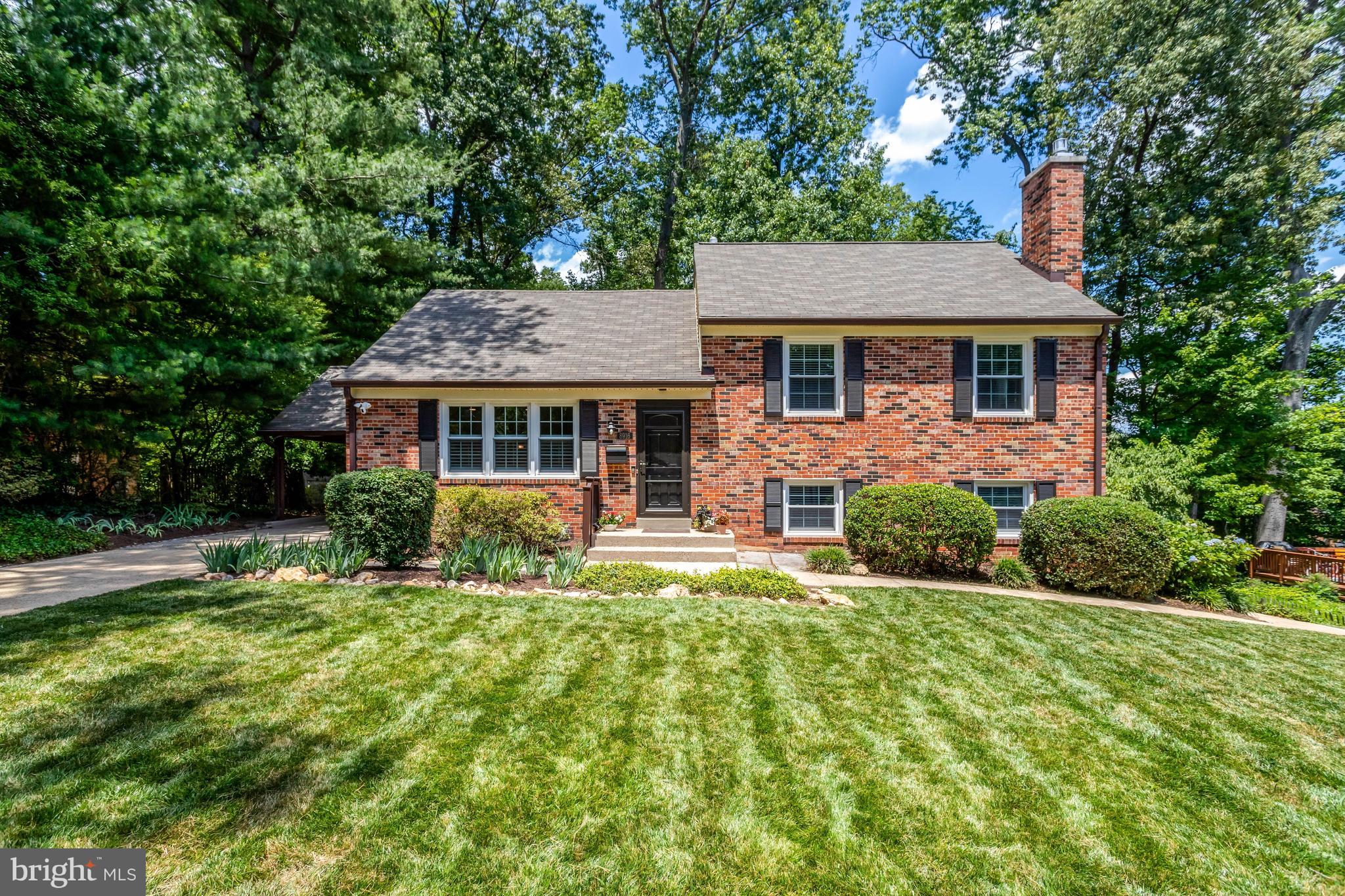 Nestled on a quiet cul-de-sac in sought-after Willow Woods (NO HOA), this beautifully updated 5-level home with walk-up  attic offers exceptional space, flexibility, and modern updates throughout. The renovated kitchen features white cabinetry and granite countertops, opening to comfortable living and dining spaces accented by hardwood floors on the main and upper levels. Enjoy year-round comfort in the heated and cooled sunroom overlooking the expansive fenced backyard.

Updated bathrooms throughout include a spacious hall bath with dual sinks. Thoughtfully designed built-in closet systems throughout the home maximize organization and storage. The versatile floor plan includes a private third-level bedroom, while the  attic provides additional storage and offers potential to finish as a bedroom, playroom, hobby room, or flex space.

The lower level features a welcoming family room, full bath, and dedicated office space that could be used as a 5th bedroom.  A rare second lower level—seldom found in Willow Woods—adds tremendous living and storage capacity with a spacious recreation room, laundry area, and abundant storage space. Major system updates include the HVAC (2021) ,roof (2019) and whole-home generator, providing added peace of mind.

Outdoor living is a dream with a large patio, storage shed, playground equipment, and plenty of room for entertaining, gardening, or play. The expansive fenced backyard offers exceptional outdoor space rarely found in the neighborhood. Additional highlights include a carport with additional attic storage and a prime cul-de-sac location close to parks, schools, shopping, and commuter routes.

This unique and spacious home offers the perfect combination of character, functionality, storage, and modern updates in one of Willow Woods' most desirable settings.