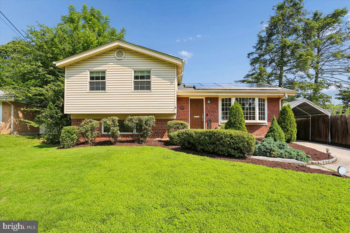 JUST LISTED - OPEN SUNDAY  July 26th 1:00 - 3:00   Welcome home to this beautifully updated and move-in-ready 3-bedroom, 2-full-bath split-level in the desirable Aspen Hill Park community. Freshly painted throughout, this inviting home features newly refinished hardwood floors on the main and upper levels, complemented by engineered wood flooring on the lower level.

Enjoy peace of mind knowing that all the major systems have already been updated, including the roof, HVAC system, water heater, and dual-pane windows—helping minimize maintenance expenses for years to come. Winters are warm and comfortable with efficient natural gas heat, while the roof-mounted solar panels help keep electric bills remarkably low.

Filled with natural light, the spacious living room showcases a dramatic vaulted ceiling, a large bay window, a ceiling fan, and elegant picture-frame moldings. The adjoining dining room opens to the rear deck, creating an ideal space for indoor-outdoor dining and entertaining. The updated kitchen, with a bay windowed view of the rear yard, offers granite countertops, an upgraded gas range, and abundant cabinetry.

Upstairs, you'll find three generously sized bedrooms, including a primary bedroom with convenient dual access to the hall bath with a walk-in shower. A hall linen closet completes this level.

The finished lower level features a spacious recreation room with custom built-ins and painted wood paneling, providing the perfect space for relaxing, entertaining, or working from home. This level also includes a full bath, laundry/utility room, and a mudroom with direct access to the backyard.

Outside, enjoy the private backyard with a wood deck overlooking mature landscaping and a charming patio. The exterior has been freshly trimmed and mulched, creating an attractive, low-maintenance setting. An electric vehicle charger and a large car canopy also convey with the home, adding even more convenience. A ring doorbell and rear camera, currently not monitored, can be utilized and monitored, if desired.

Ideally located in sought-after Aspen Hill Park, this home offers easy access to shopping, schools, parks, and major commuter routes. Combining thoughtful updates, energy-efficient features, and a fantastic location, this home is ready for its next owners to move in and enjoy for years to come!