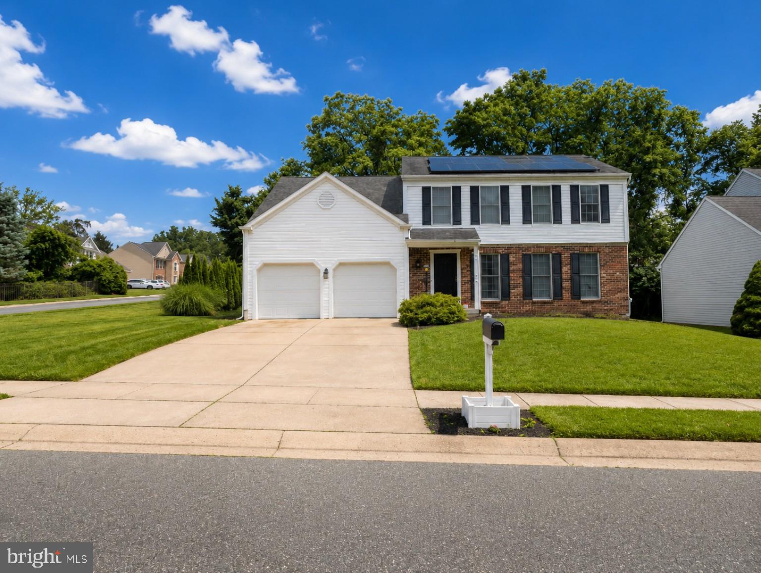 Welcome to your next home located at 2606 Smallwood Drive. This beautiful colonial in the sought-after neighborhood of Overview Manor checks all the boxes. The sellers have beautifully maintained this wonderful family home with thoughtful updates, including an amazing sunroom, vinyl plank flooring, new carpet  and much more. The updated kitchen features beautiful granite countertops, LVP flooring, and stainless steel appliances, and opens to a generously sized family room.  One of the true highlights of this home is the stunning porch complete with a ceramic tile floor and cathedral ceiling overlooking the wonderful fenced in backyard. Upstairs offers generously sized bedrooms, including a spacious primary suite with a walk-in closet. The newly finished lower level provides flexible space for a media area, playroom, or home office, along with a half bath, laundry area, and ample storage. Step outside to a private fenced yard that offers the ideal balance of entertainment space and green space. Whether you're hosting gatherings or enjoying a quiet evening outdoors, this backyard is designed to fit your lifestyle. Enjoy the feeling of your own private oasis while still being conveniently located near shopping, dining, and major commuter routes. Schedule a showing today. You will not be disappointed!