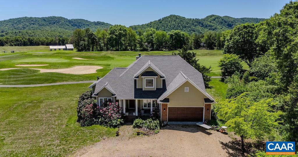 A rare opportunity to own a golf-front home at an exceptional price. Wake up to panoramic golf course and Blue Ridge Mountain views from this home in Stoney Creek at Wintergreen ? just a short walk to Iron & Ale Restaurant. This home offers an exceptional combination of location, lifestyle, and value. A vaulted living room with stone fireplace welcomes you home, while the main-level primary suite and deck with gas fire pit overlook the 18th green, fairway, and mountains ? perfect for morning coffee or evening sunsets. Upstairs, a flexible home office suite can convert back to two bedrooms, plus an additional bedroom and bath ? more than enough room for friends and family. Enjoy Firefly Fiber Internet and Stoney Creek amenities including golf, swimming, tennis, clubhouse, and walking trails, in the heart of the Nelson 151 Trail ? just 35 minutes from Charlottesville and minutes from Wintergreen Resort Mountain Village, wineries, breweries, cideries, hiking, and skiing. Now offered at $699,999, one of the best golf-front values currently available in Stoney Creek. Offered AS IS, with the seller making no repairs or concessions ? don't miss this golf-front property in one of Central Virginia's most desirable resort communities.,Granite Counter,Wood Cabinets,Fireplace in Living Room