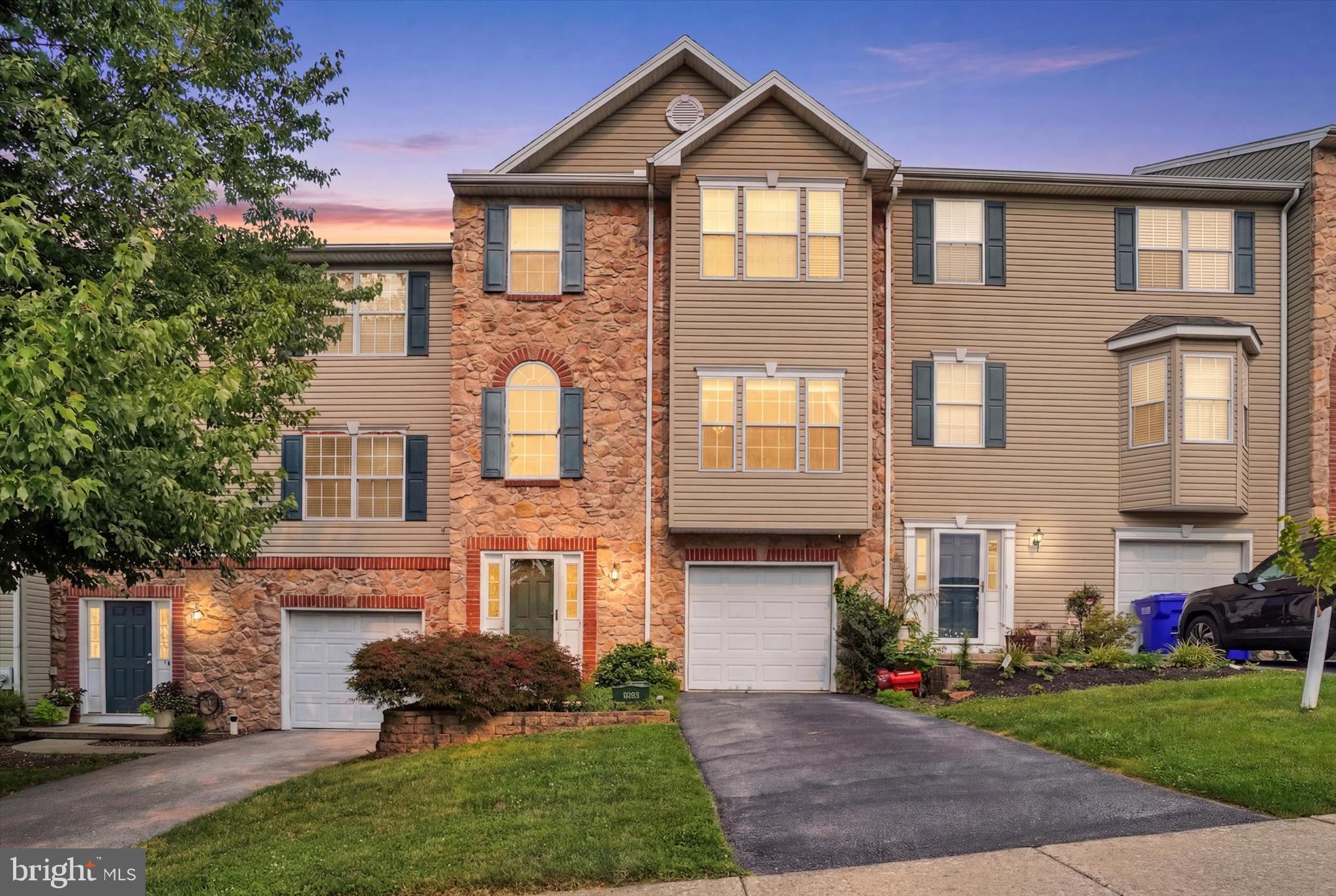 Beautiful Stone-Front Townhome Backing to Open Common Area!

Welcome home to this spacious and beautifully appointed 3-bedroom, 2 full and 2 half bath townhome nestled in one of Shrewsbury's most convenient locations. Featuring an attractive stone front, garage, and a thoughtfully designed floor plan, this home offers the perfect blend of comfort, style, and functionality.

Step inside to a tiled foyer that opens to gleaming hardwood floors throughout the main level. The heart of the home is the bright, open kitchen, complete with abundant cabinetry, a pantry, center island, all appliances, and an expansive dining area perfect for everyday living or entertaining. A sliding glass door leads to the upper level of the two-tiered deck, where you'll enjoy peaceful views overlooking the community's open common area.

The fully finished walkout lower level provides exceptional additional living space and opens directly to the lower level of the impressive two-tiered deck, creating the perfect setting for relaxing or hosting family and friends.

Upstairs, retreat to the spacious owner's suite featuring a large walk-in closet and an ensuite bath with a luxurious soaking tub, separate shower, and generous vanity. Two additional bedrooms, another full bath, and the convenience of a bedroom-level washer and dryer complete the upper floor.

Ideally located just minutes from Exit 4 of I-83, this home offers an easy commute while being close to shopping, restaurants, parks, and schools. If you've been searching for a move-in-ready home with generous living space, beautiful outdoor entertaining areas, and an unbeatable location, this one is not to be missed!