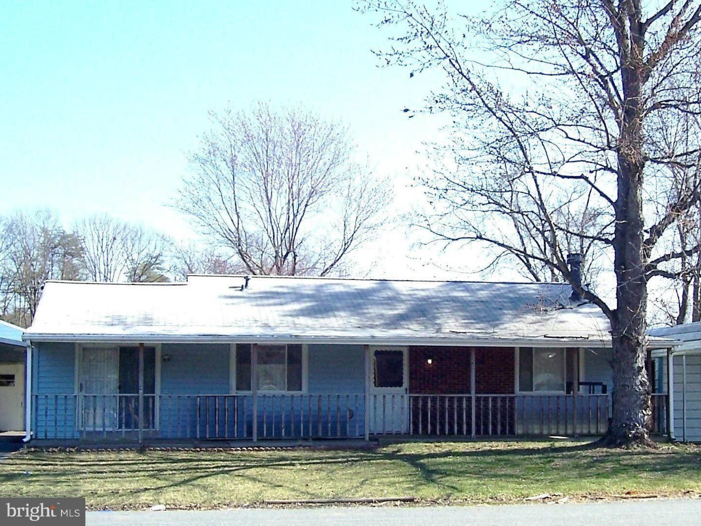 Mechanics or small business owners dream find!  3BR 1FB home with 17' x 23' workshop/home office w/electricity, 17' x 24' detached garage w/electricity and car port.  Home just freshened up and is ready to move in. Updated carpet.  Large family rm and living rm, sep laundry rm, centrally located kitchen and dining rm. Fenced rear yard w/storage shed as well as a front porch to relax on.