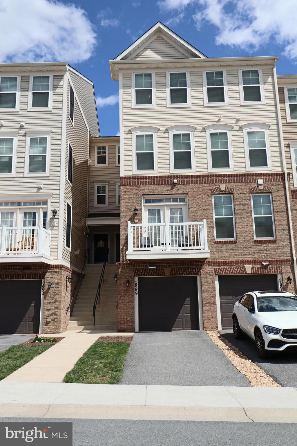 Rental in Jefferson Place which offers lot of amenities - community center with fitness center, outdoor pool, volleyball court, playground, dog park and easy access to many local stores and shopping.

Main Level - Beautiful open concept with wood floors - 1/2 bath powder room for guest, living room with French doors leading to the balcony for quite relaxing outdoor time, light-filled dining room, and spacious kitchen for the culinary at heart with all the amenities of preparing meals. 

Upper Levels - two bedrooms with full bath and staircase leading to the Primary bedroom with Tray Ceiling and bathroom with dual vanity sinks, soaking tub, separate shower and private toilet with its own enclosure. 

1st Level - street level - one car attached garage with Electric car charger and carport for an additional vehicle.  

Additional Features - Nest doorbell, Nest thermostat, and My Q smart garage opener.
