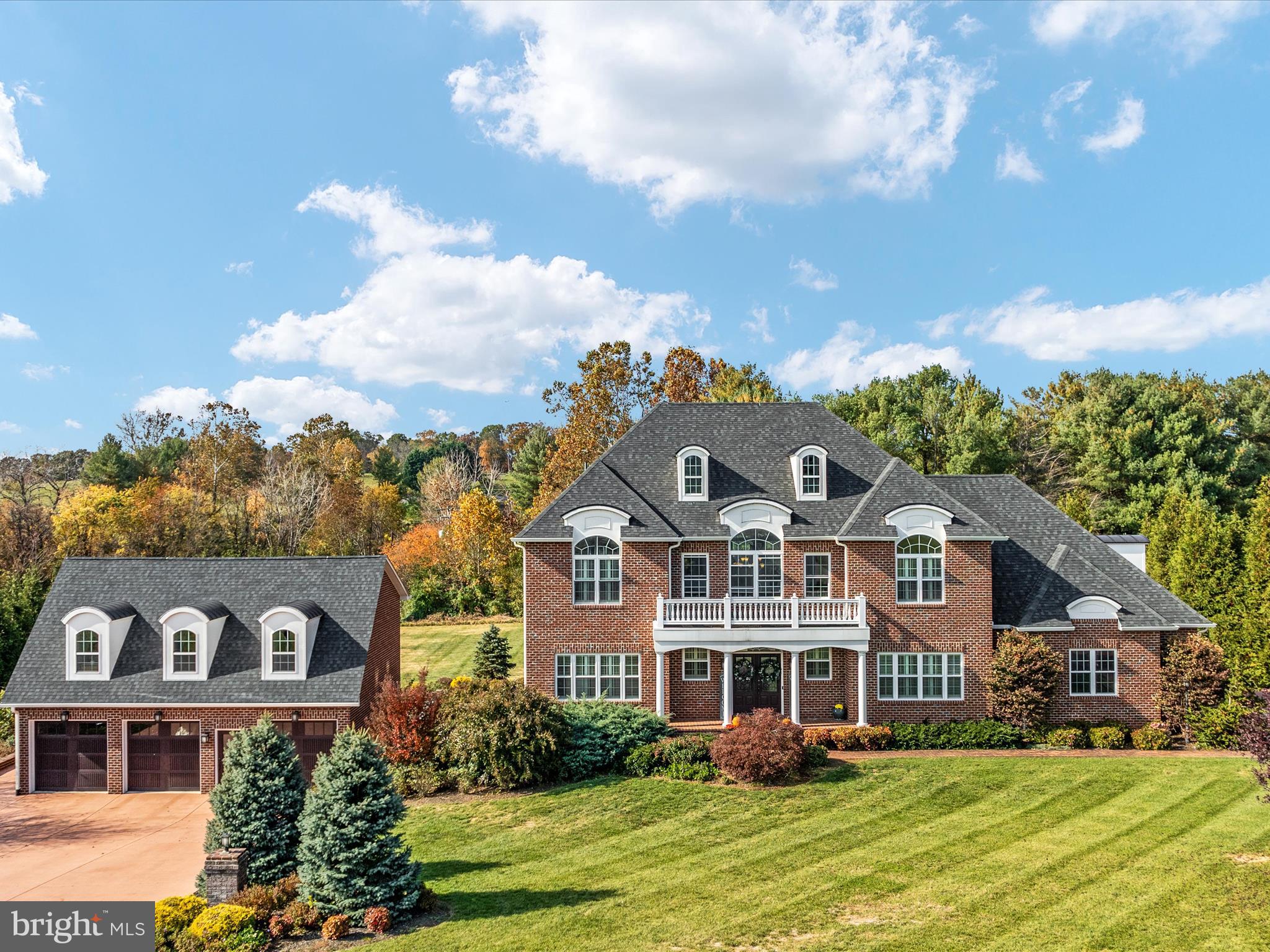 Welcome to 77 Bowling View Dr., an exquisite luxury brick manor that combines elegant design, modern amenities, property adjoins  the Shenandoah Valley Golf Club. This 5-bedroom, 4 -full bathroom and 4- half bathroom estate spans over an acre of beautifully landscaped grounds, with every inch of the home showcasing meticulous care and attention to detail. Upon entering, you’ll be captivated by the grand entryway leading to a spacious formal dining room and a chef’s gourmet kitchen, complete with top-of-the-line stainless steel appliances, a generously sized island, and endless counter space. The living room and entry features two story ceilings, creating an airy and inviting ambiance, while a main-level laundry room and half bath add extra convenience. The crown jewel of the main floor is the expansive primary suite, boasting a luxurious attached bathroom with a soaking tub, separate vanities, and ample storage space—designed for ultimate relaxation and functionality.

Upstairs, two of the four bedrooms include a private en-suite bathroom, offering both comfort and privacy for family and guests. An additional bonus room offers additional living space. The lower level is an entertainer's paradise, featuring two expansive recreation rooms, a fully equipped bar area with a fridge, wine fridge, and kegerator, and a home theater that’s perfect for movie nights in. With two additional half bathrooms on this level, hosting gatherings is seamless and easy. Stepping outside, enjoy an outdoor kitchen and bar area with a built-in grill, plenty of seating, and a freestanding wood-burning fireplace, all overlooking a private in-ground pool and basketball court. Appreciate the detached 3 car garage with a two bedroom , two bathroom apartment with it's own kitchen, living room, and laundry! This outdoor oasis is ideal for both lively entertaining and quiet relaxation, set against the backdrop of lush greenery. With luxury touches throughout and an ideal location, this home offers a lifestyle of elegance and ease. Don’t miss your opportunity to call Bowling View your forever home!