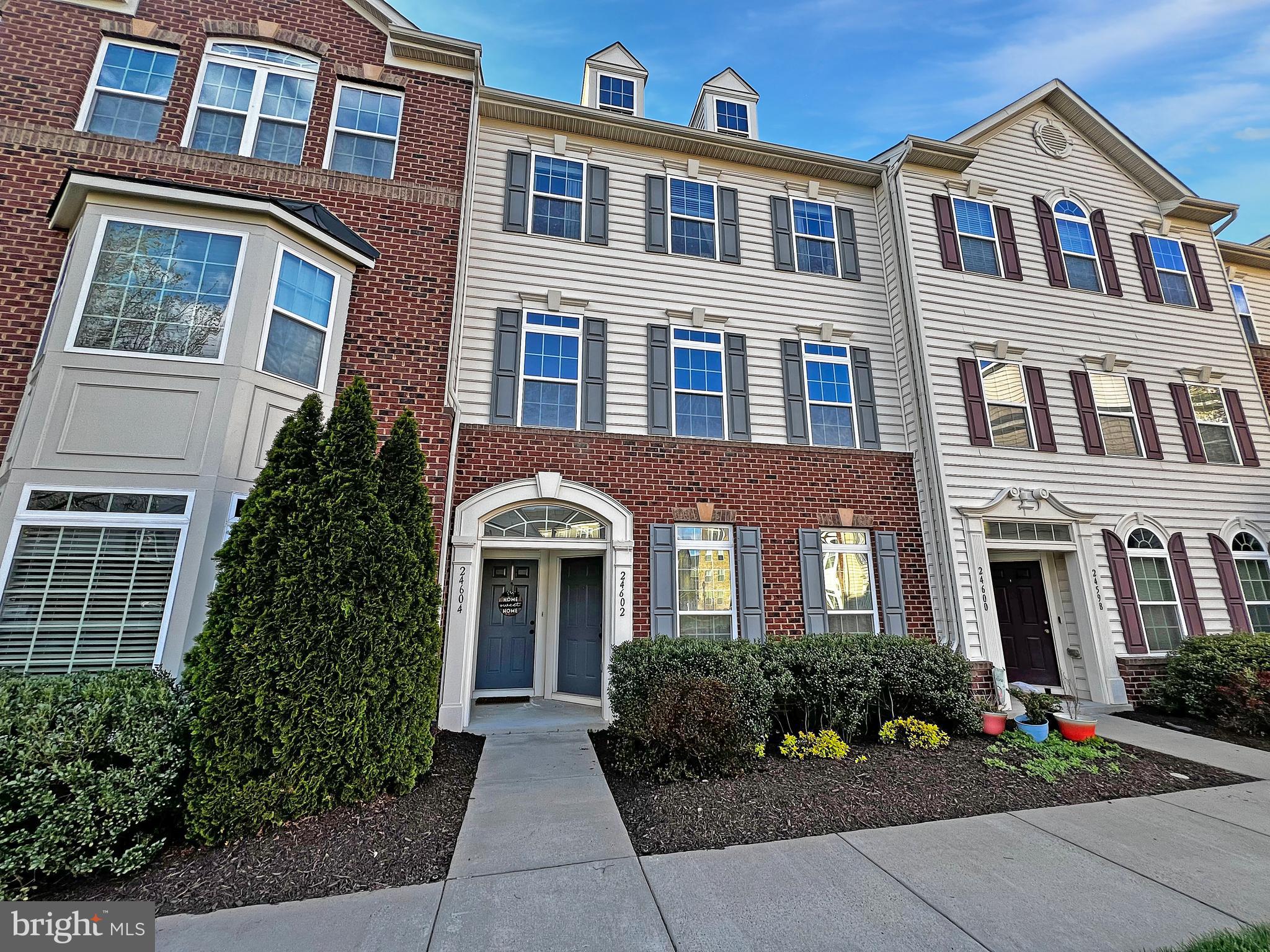BEST DEAL IN STERLING!  Your new outstanding townhouse condo in the Arcola Town Center community awaits! This unbelievably spacious 3-bedroom, 2.5-bathroom home has amazing entry level living area with living room, dining room, kitchen and a half bath . . . plus a one-car garage! The open floor plan on the main level encourages community and interaction making it the perfect spot to unwind after a busy day.  The kitchen boasts stainless steel appliances and granite countertops,  sure to please any and all who love to  cook!  On the upper level, you'll discover three huge bedrooms, to include a light and bright primary bedroom with two walk in closets and a spacious attached primary bathroom.  You'll also find a balcony off bedroom number two making this a lovely spot to sit and relax.  Full hall bath with tub and bedroom level laundry room are also giant pluses!  Come see and fall in love!