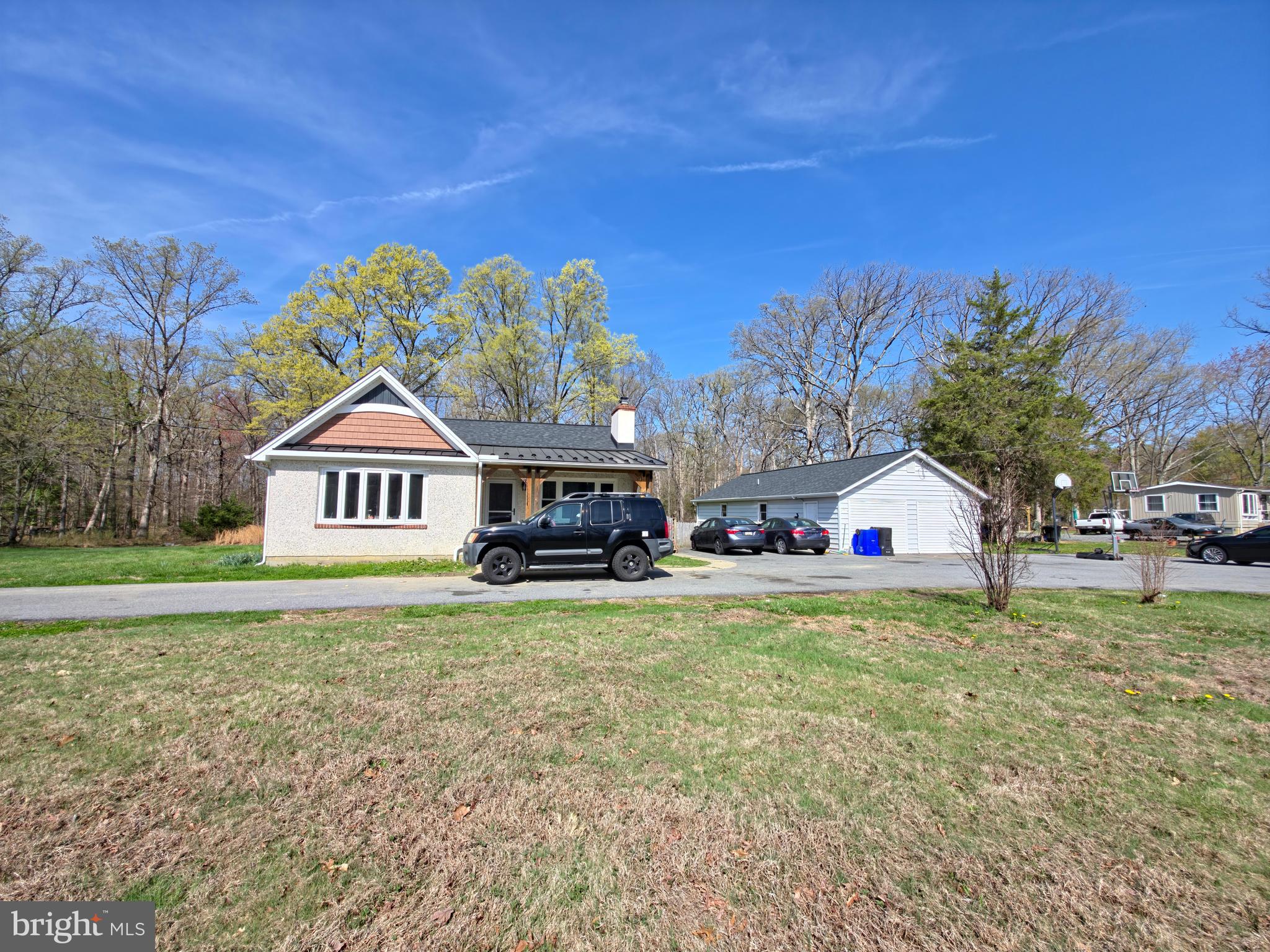 HUGE Price reduced!!!   Discover a one-of-a-kind real estate opportunity in Waldorf! This expansive 2.7-acre private level lot features not one, but two fully legal, independent residences, offering unparalleled versatility for multi-generational living, a massive home office, or a high-yield rental investment.

Main Residence:
A charming, move-in-ready 1,119 sq. ft. rancher featuring 3 spacious bedrooms and 1.5 bath. Enjoy the warmth of refinished solid oak floors, fresh paint, and modern updates throughout.

The "Bonus" Second Residence (Newly Completed with CO):
Thoughtfully converted from a massive detached structure into a fully permitted 1,200 sq. ft. legal dwelling. 
This second home boasts:
3 Bedrooms & 1 Full Bath with a functional kitchenette.
Independent Electric Meter: Perfect for separate billing and true privacy.
Official Certificate of Occupancy (CO): Buy with peace of mind knowing this is a 100% legal living space approved by Charles County.

Exterior & Location:
The sprawling 2.7-acre grounds offer a serene, park-like setting with plenty of cleared space for gardening, recreation, or additional structures. While the garage has been transformed into a living space, the property features a massive driveway accommodating 6+ vehicles.
Located in the sought-after McDonough HS district, you get the peace of rural living with quick access to Waldorf’s shopping, dining, and commuter routes.

Key Features at a Glance:
Total 6 Bedrooms / 2.5 Baths across two buildings.
2.7 Acres of flat, usable land.
Separate Electric Meters for each unit.
Ideal for "Live in one, rent the other" to pay your mortgage!
Don’t miss this rare "Compound" setup—legal dual-occupancy properties with this much land and a CO are almost impossible to find in Charles County!