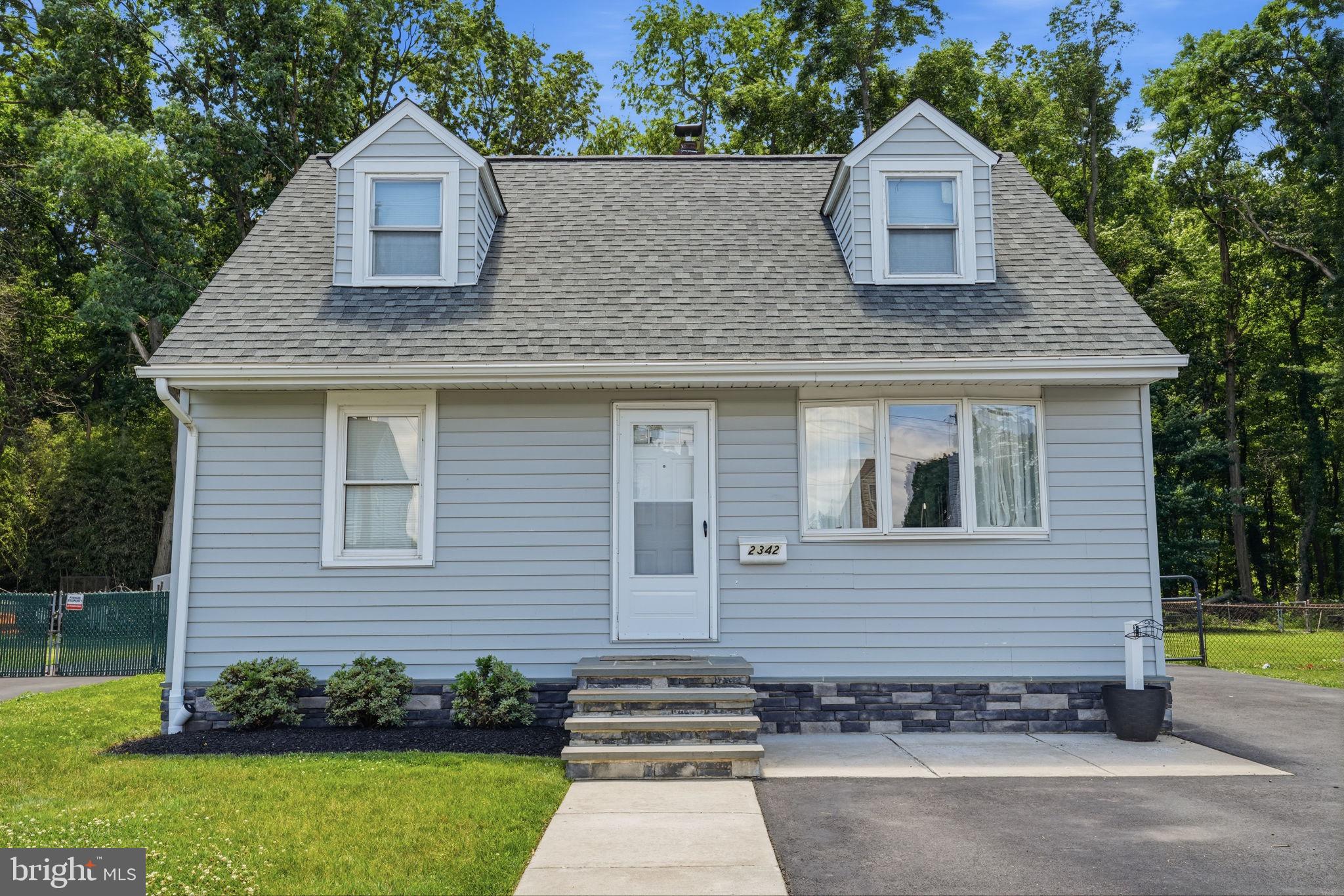 Welcome home to this beautifully updated, move-in-ready Cape Cod. Designed with a bright, open-concept floor plan, the seamless flow between the main living area and the kitchen creates the perfect space for entertaining friends and family. The  Eat-In Kitchen features timeless white cabinetry, sleek granite countertops, an under mount sink, recessed lighting, a modern subway tile backsplash, and stainless steel appliances. A rear door opens directly to the backyard for enjoyable indoor-outdoor living.
 
 Spacious main bedroom on first floor with large en-suite bath offers excellent storage and a stall shower with white subway tile and a built-in product nook. Another full bath conveniently located down the hall, featuring vinyl plank flooring, with updated lighting, and a beautifully tiled tub/shower combo. 
The Upper Level  features two bright bedrooms with classic dormer windows (one including a cozy built-in window seat) with  ample closet space, A roomy, level, yard that backs up to a peaceful wooded area—perfect for privacy and relaxation. A full basement provides all the extra storage space you could need. 

Many updates throughout with heat pump, central air, newer kitchen, both newer bathrooms, fenced yard, large shed and brand new roof!

Location is everything! You are just minutes away from local parks, the scenic Delaware River waterfront, and the Croydon SEPTA regional rail station for an effortless commute into Center City or New York. Close to I-95, Route 13, and the PA Turnpike. Schedule your private tour today and see all the potential this lovely home has to offer!